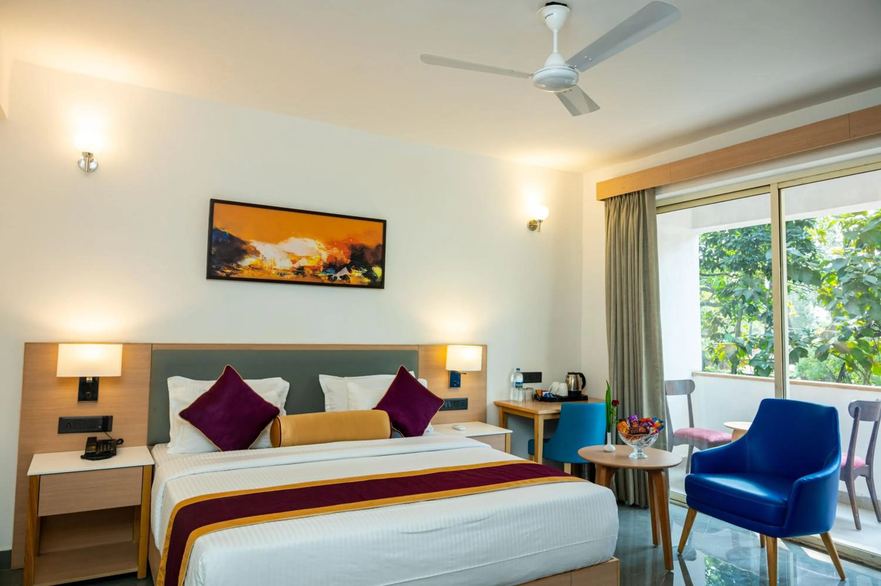 Living room, Bed in Hotel Meraden Opus , Anjuna Beach Goa