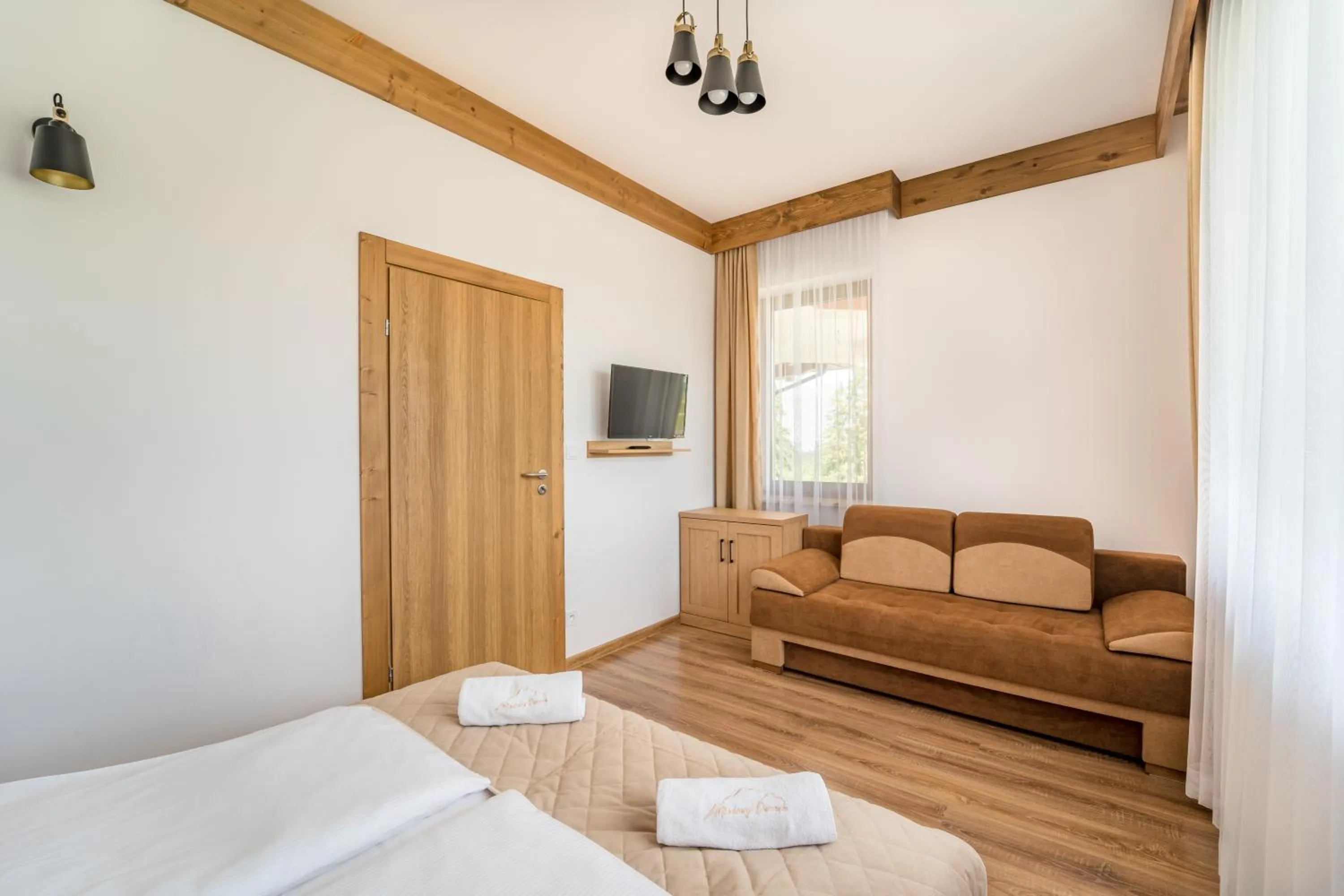 Photo of the whole room, Bed in Miodowy Dworek