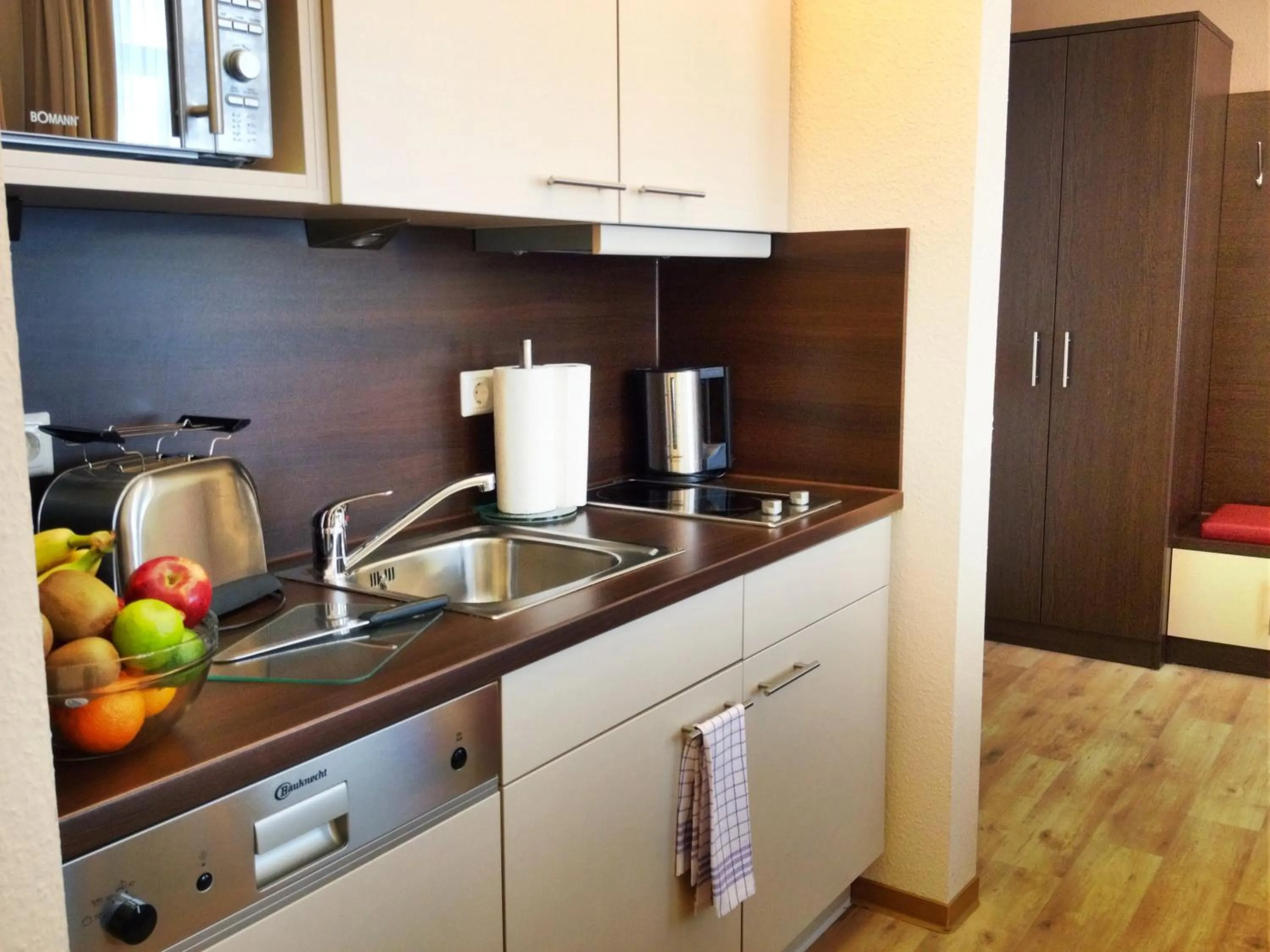 Kitchen or kitchenette in Apartmenthotel Quartier M