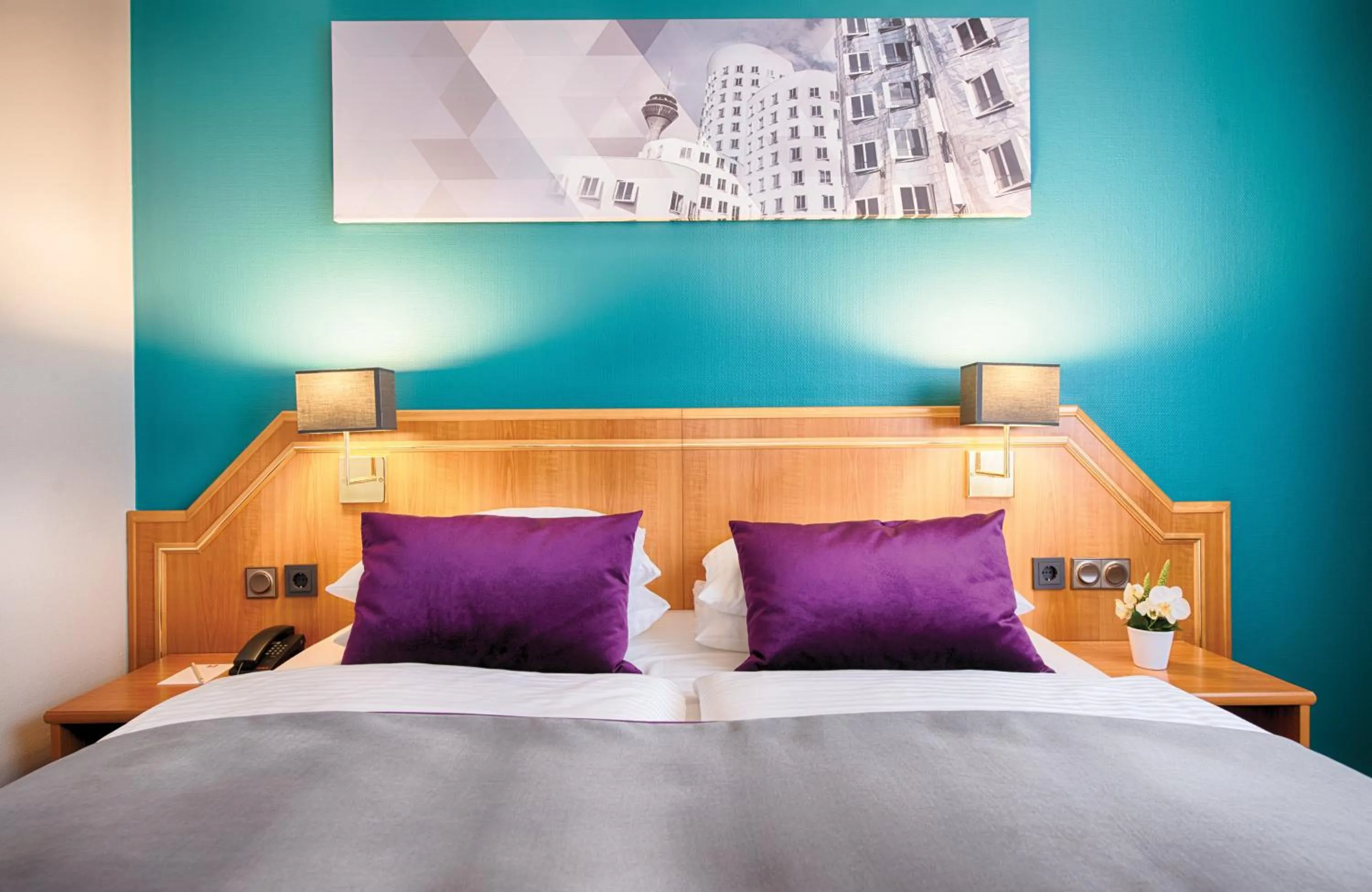 Bedroom, Bed in Leonardo Hotel Düsseldorf City Center