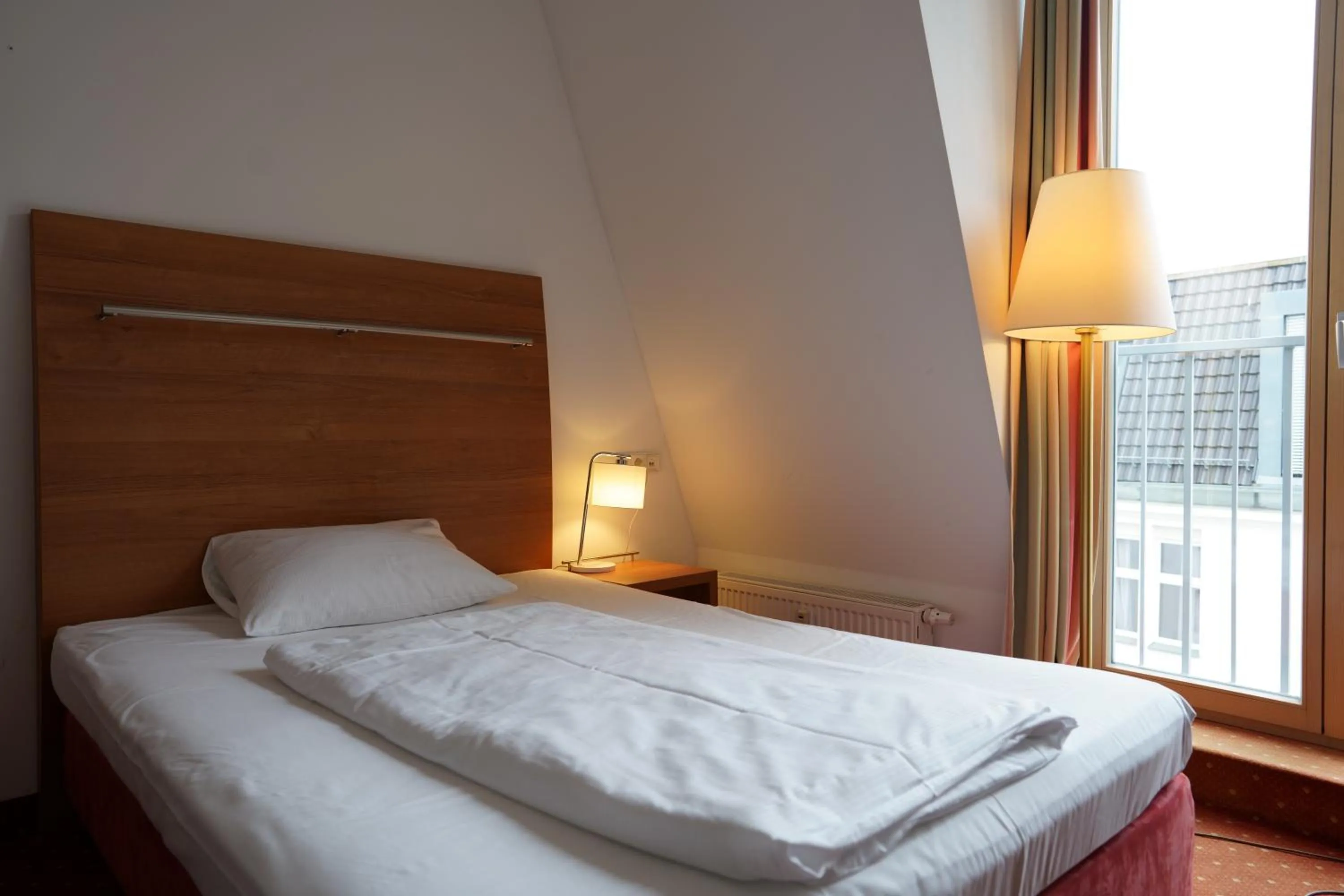 Photo of the whole room, Bed in Hotel Ambert