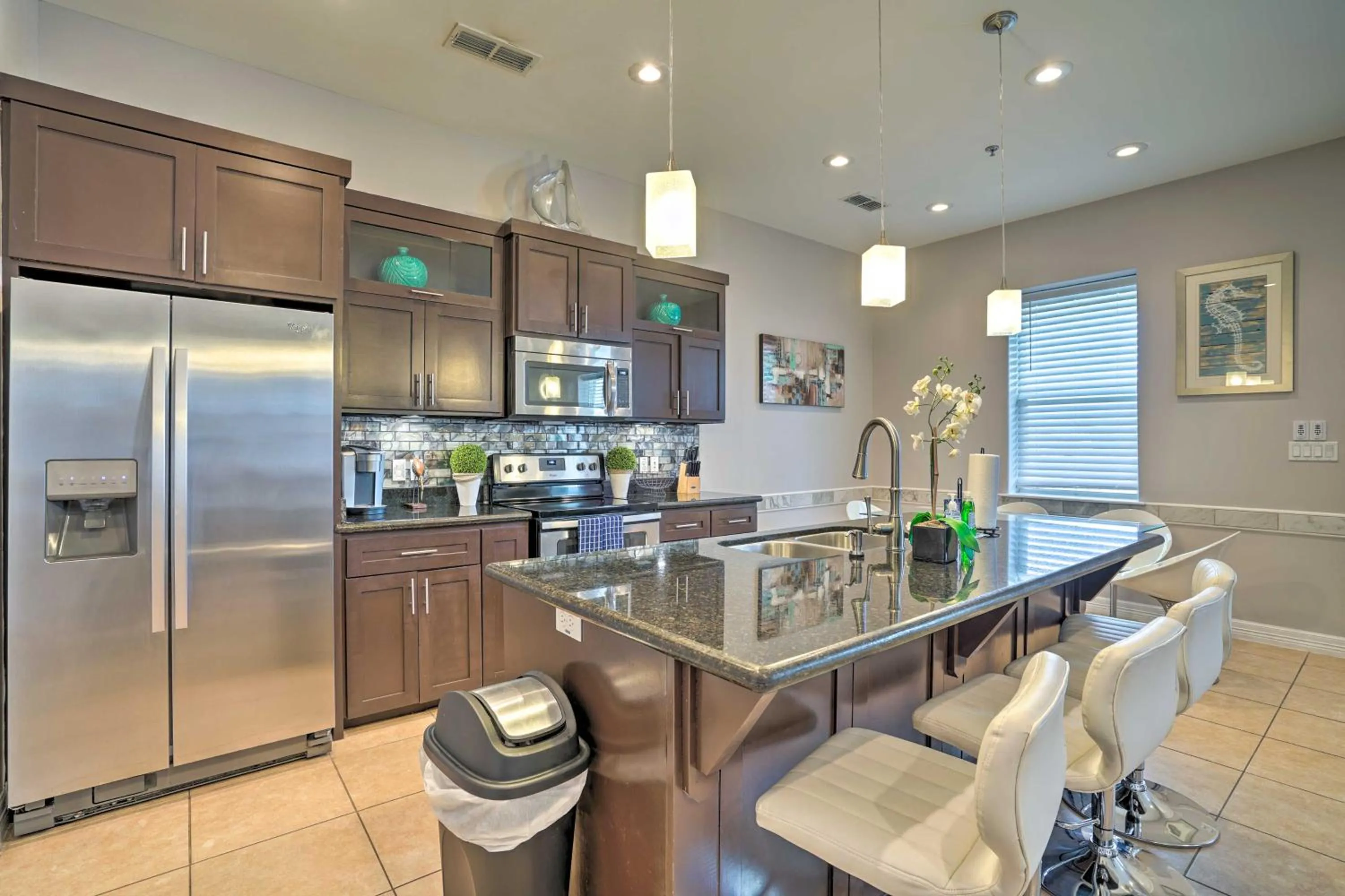 Updated Fiesta Isles Condo with Bay Views and Pool!