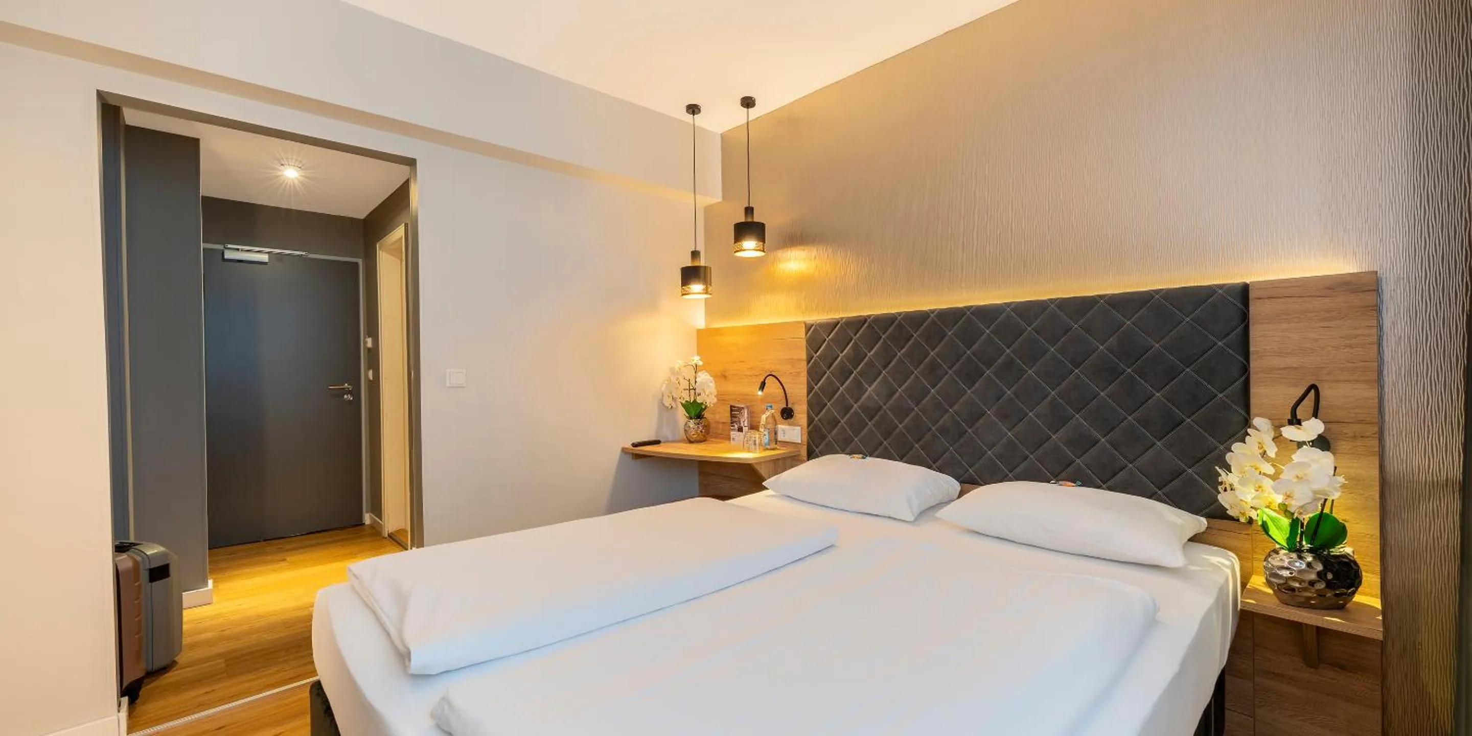 Bed in PLAZA INN Rieker Stuttgart Hauptbahnhof