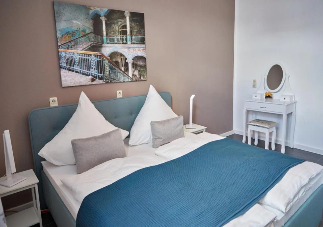 Bedroom, Bed in Cityhotel Bernburg