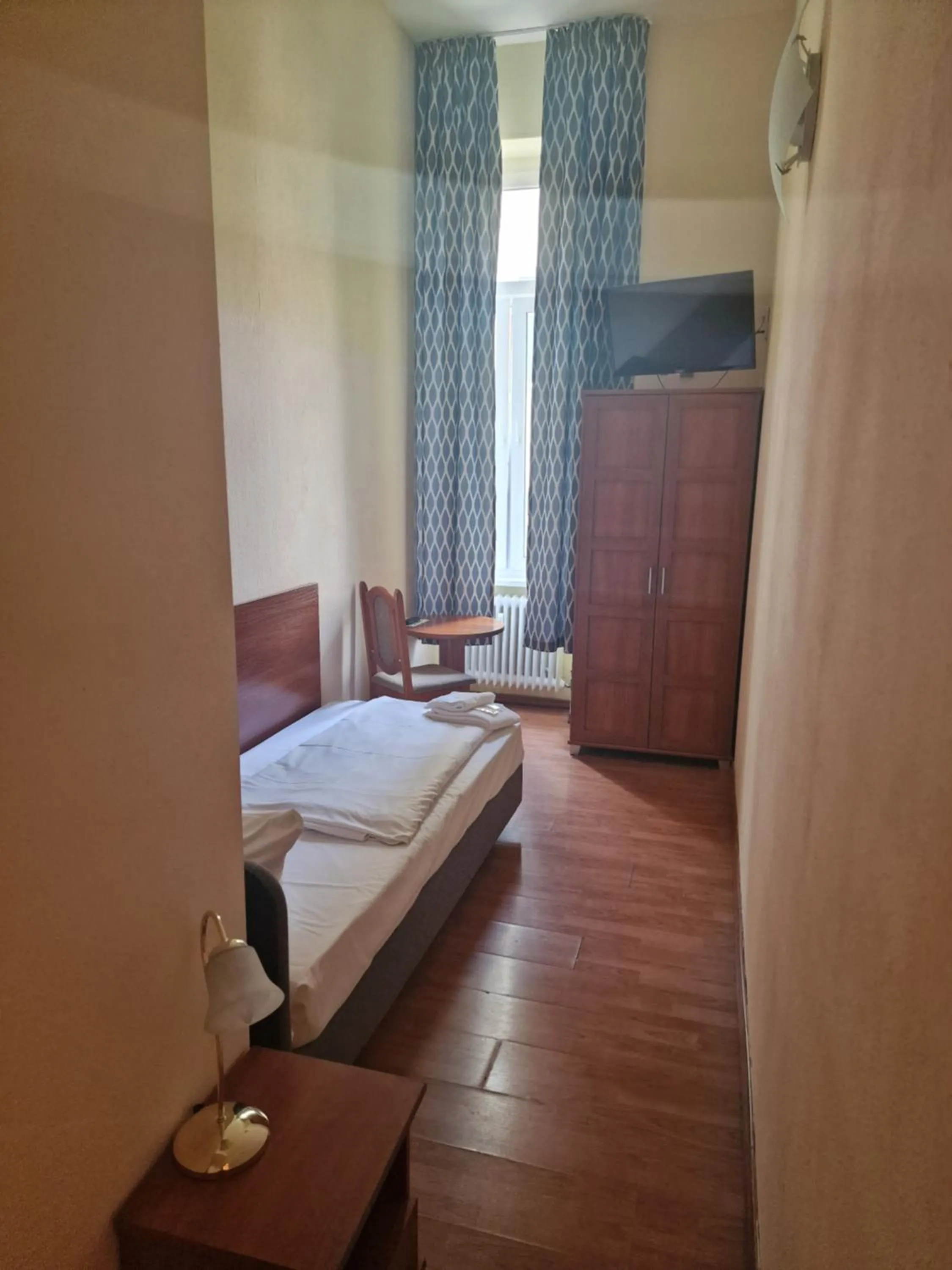 Bed in Hotel Am Stuttgarter Eck