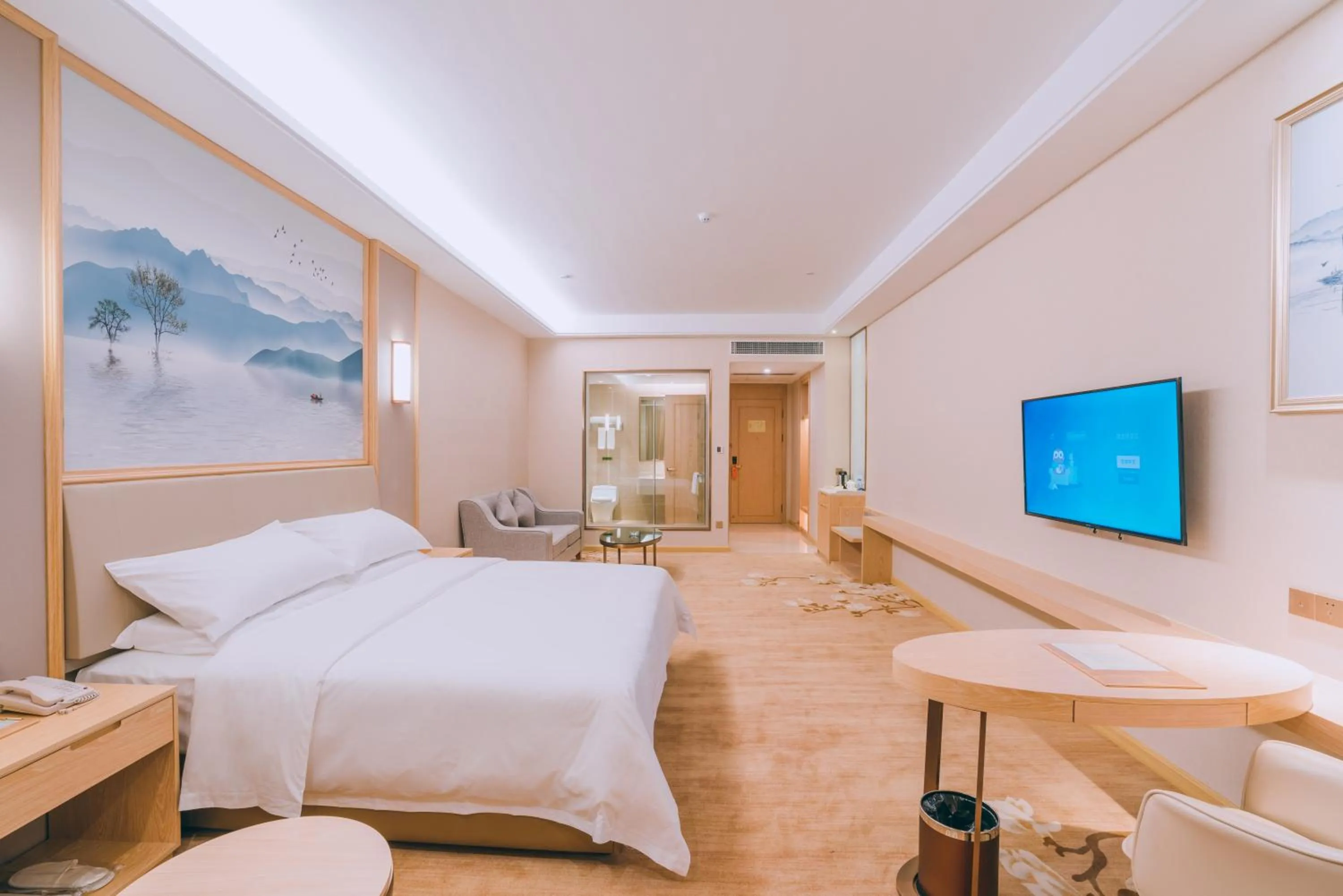 Photo of the whole room, Bed in Vienna International Hotel (Lianjiang Avenue Xinyuan International Plaza)