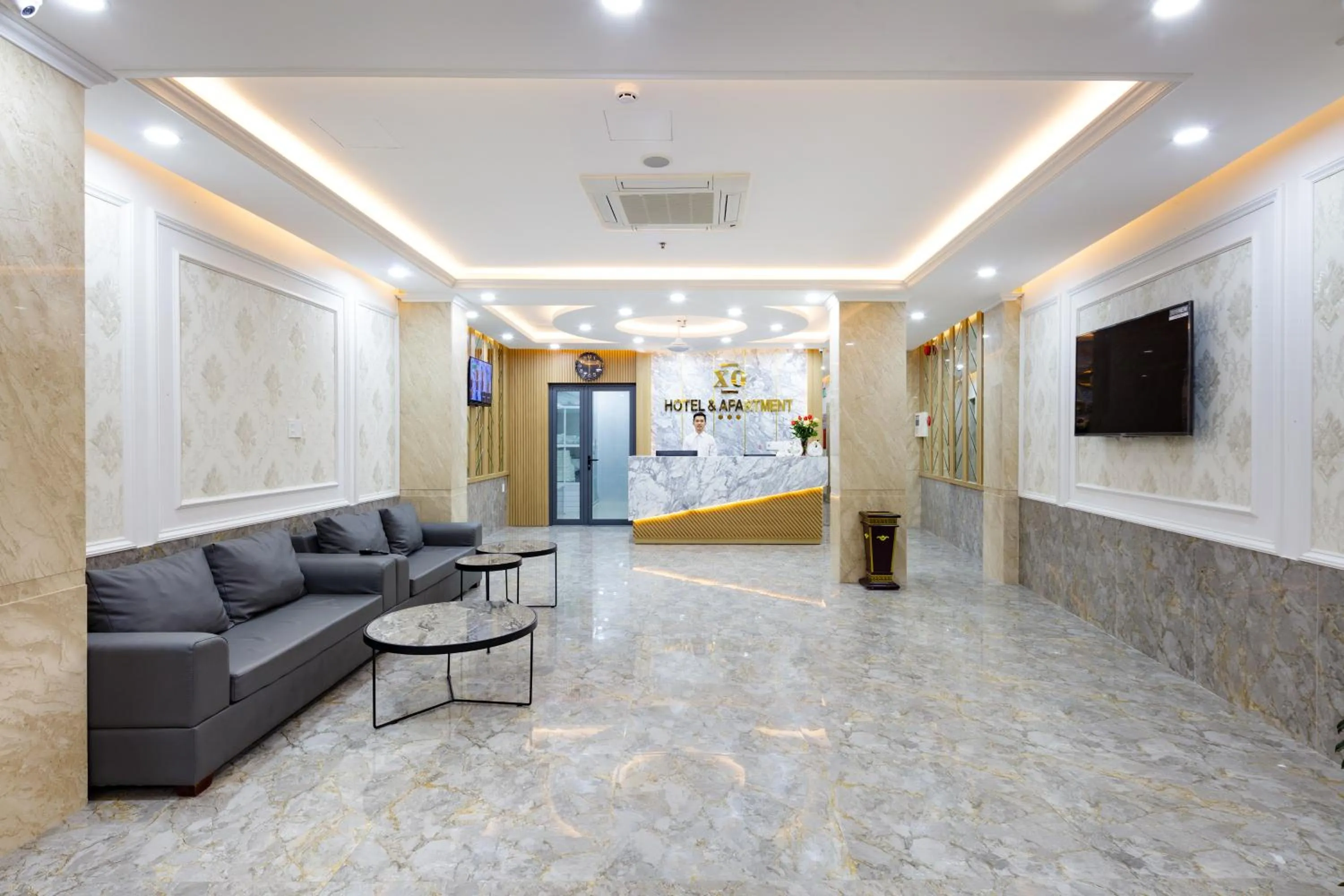 Lobby or reception in XO Hotel & Apartments