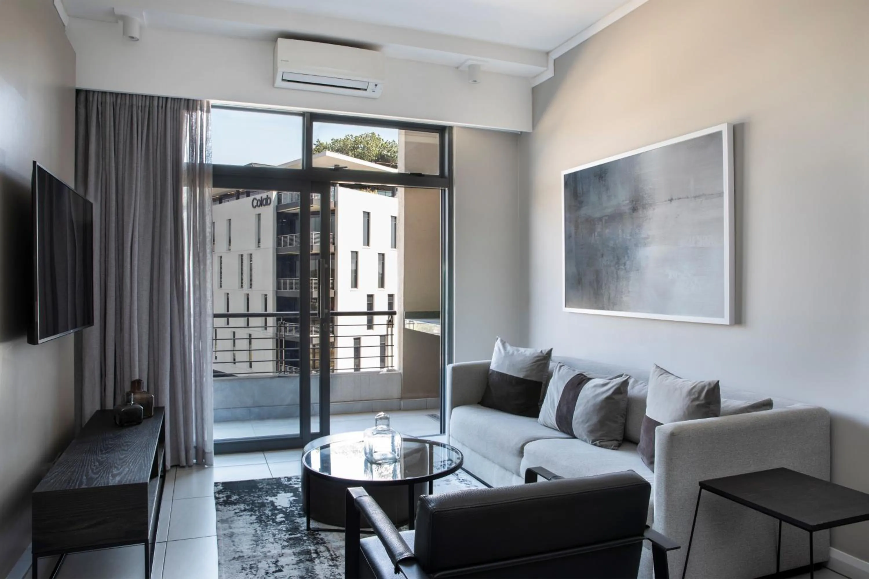 Living room in The Capital Trilogy Menlyn Maine