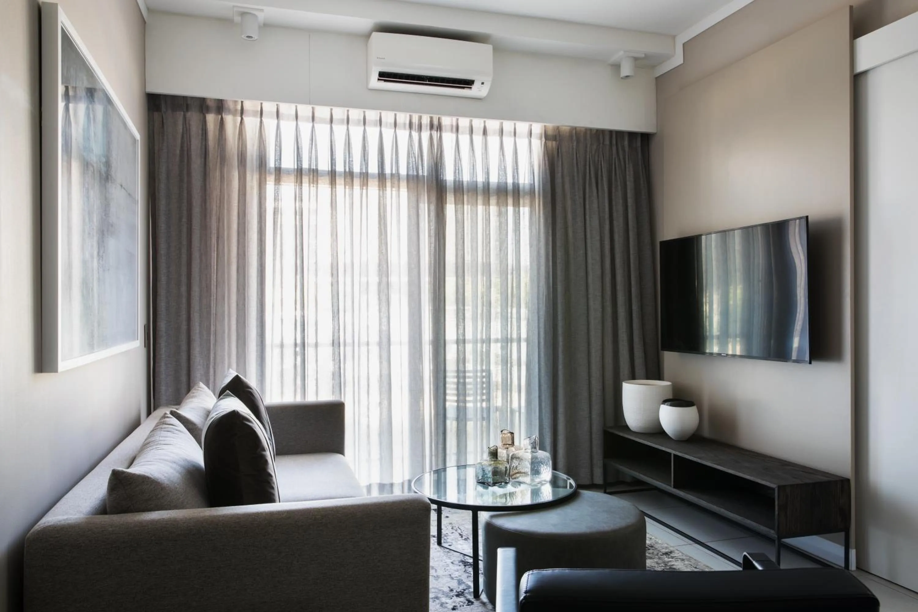 Seating area in The Capital Trilogy Menlyn Maine