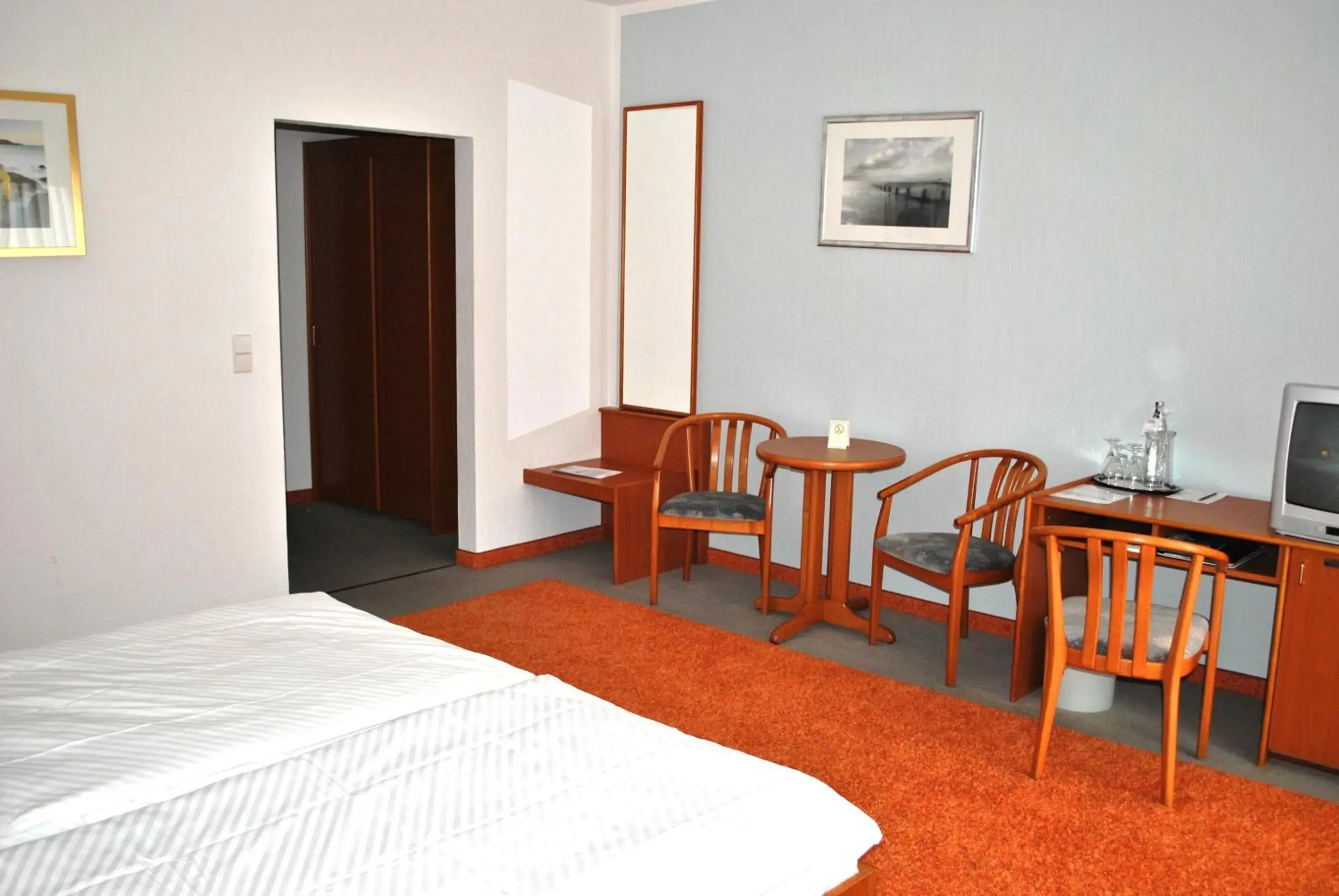 Bed in Heidehotel Lubast Bed in Heidehotel Lubast