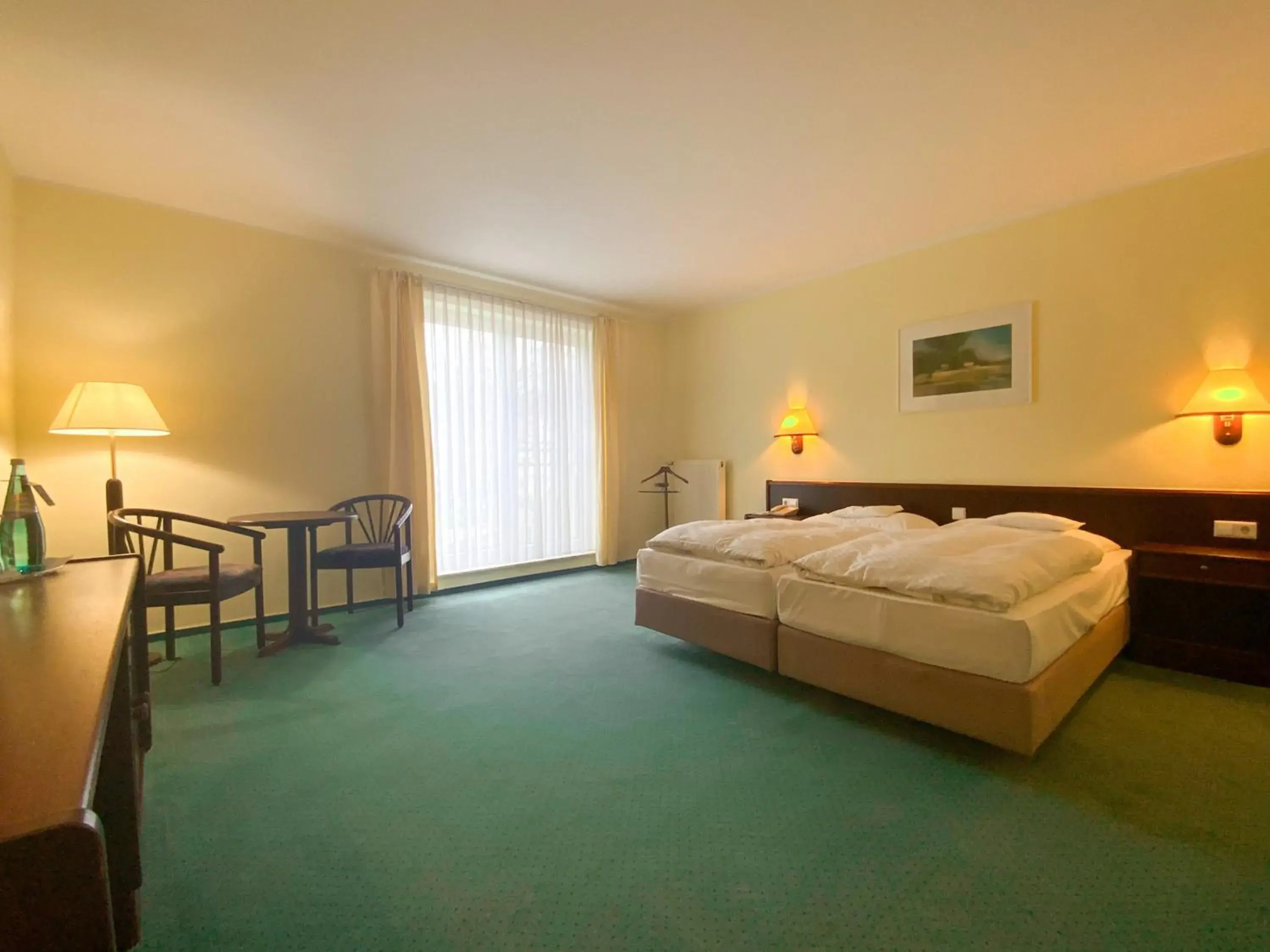 Bed in Heidehotel Lubast Bed in Heidehotel Lubast