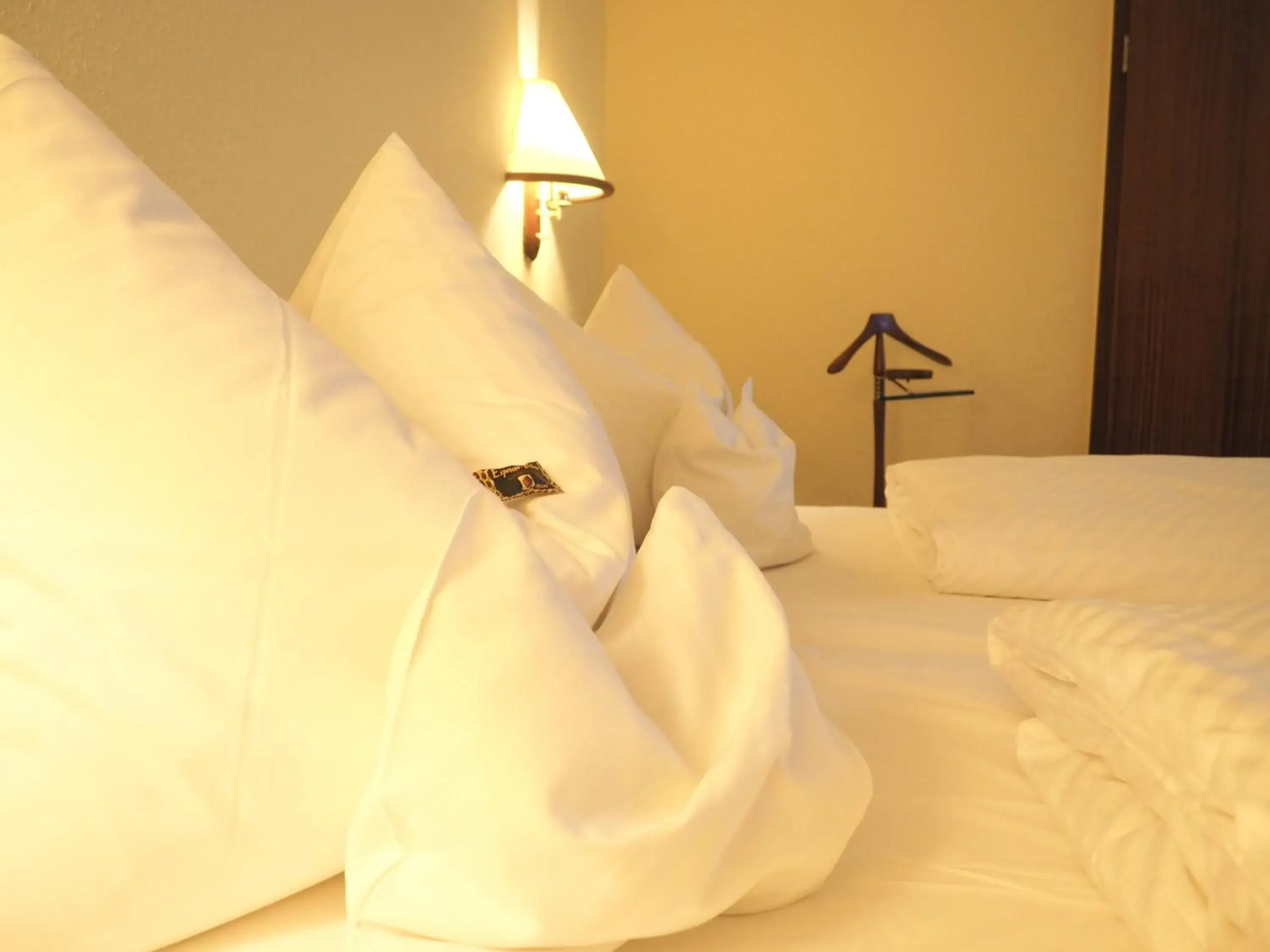 Bed in Heidehotel Lubast Bed in Heidehotel Lubast