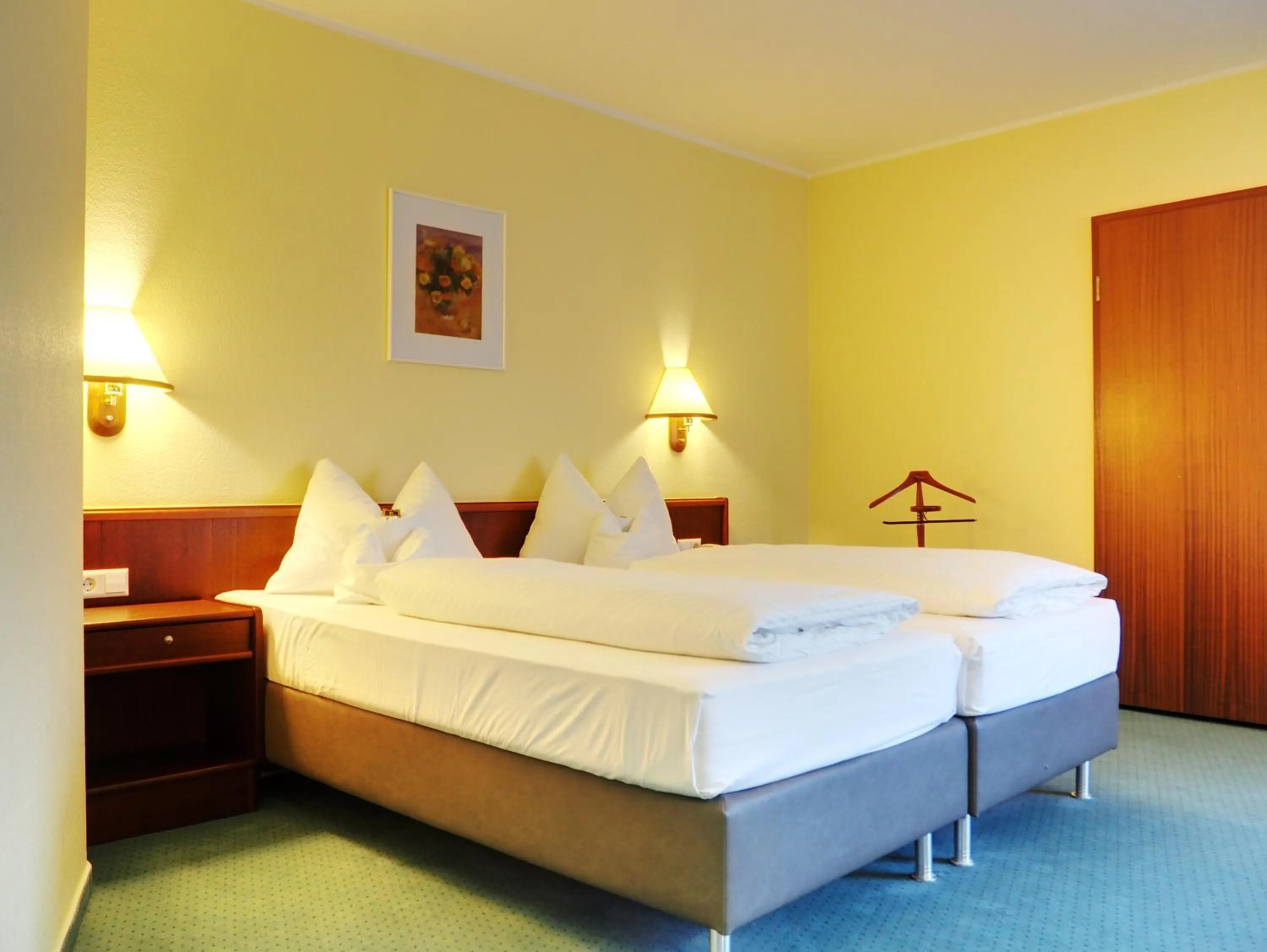 Bed in Heidehotel Lubast