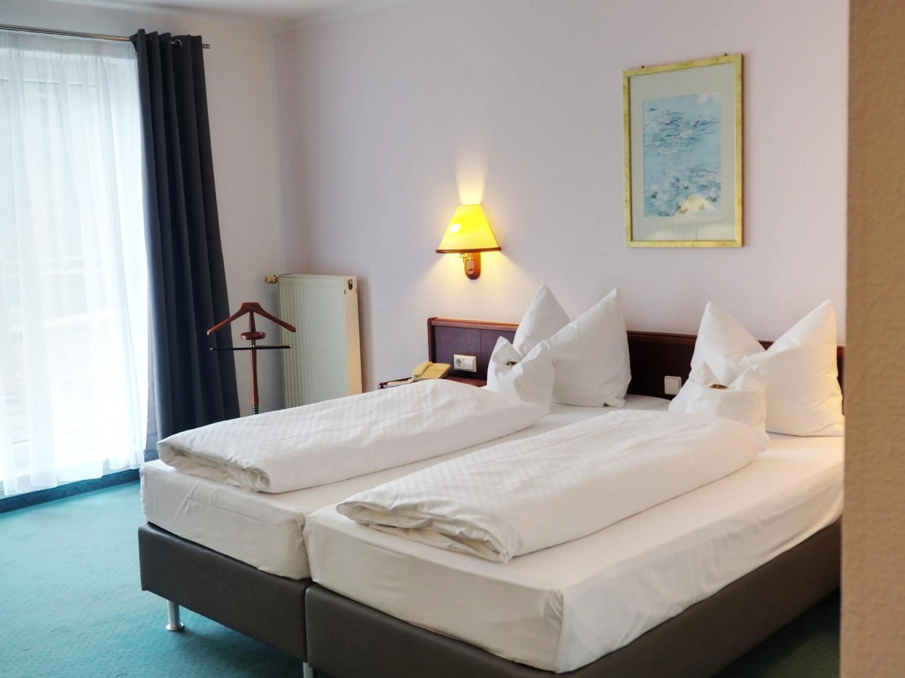 Bed in Heidehotel Lubast