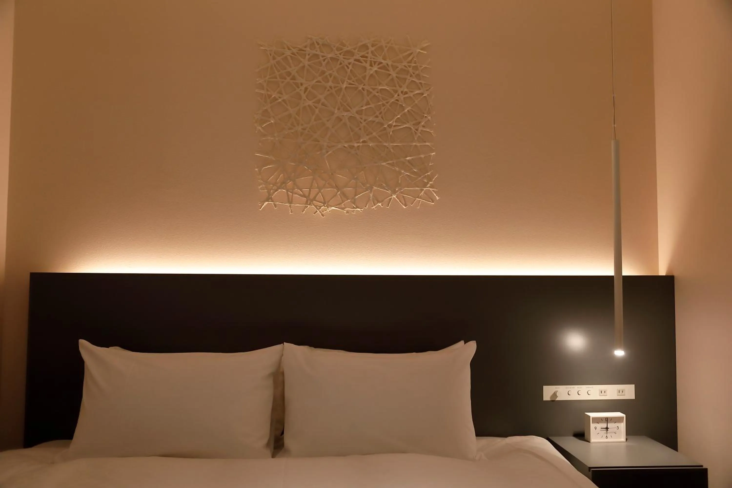 Bed in HOTEL FORZA SAPPORO STATION