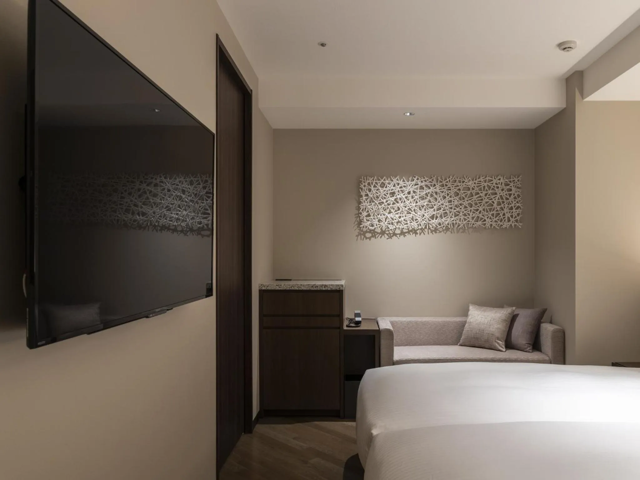 Bed in HOTEL FORZA SAPPORO STATION