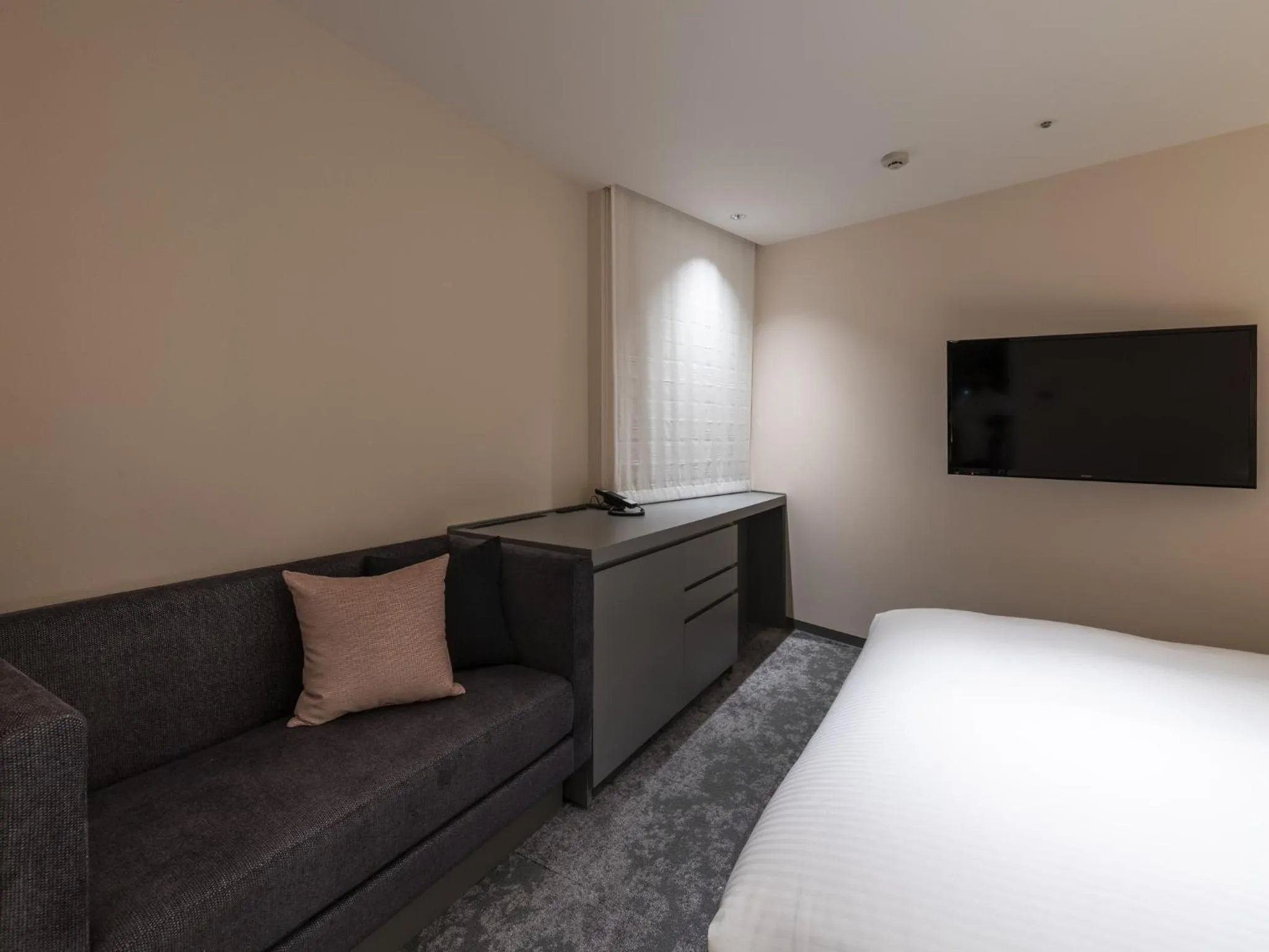 Bed in HOTEL FORZA SAPPORO STATION