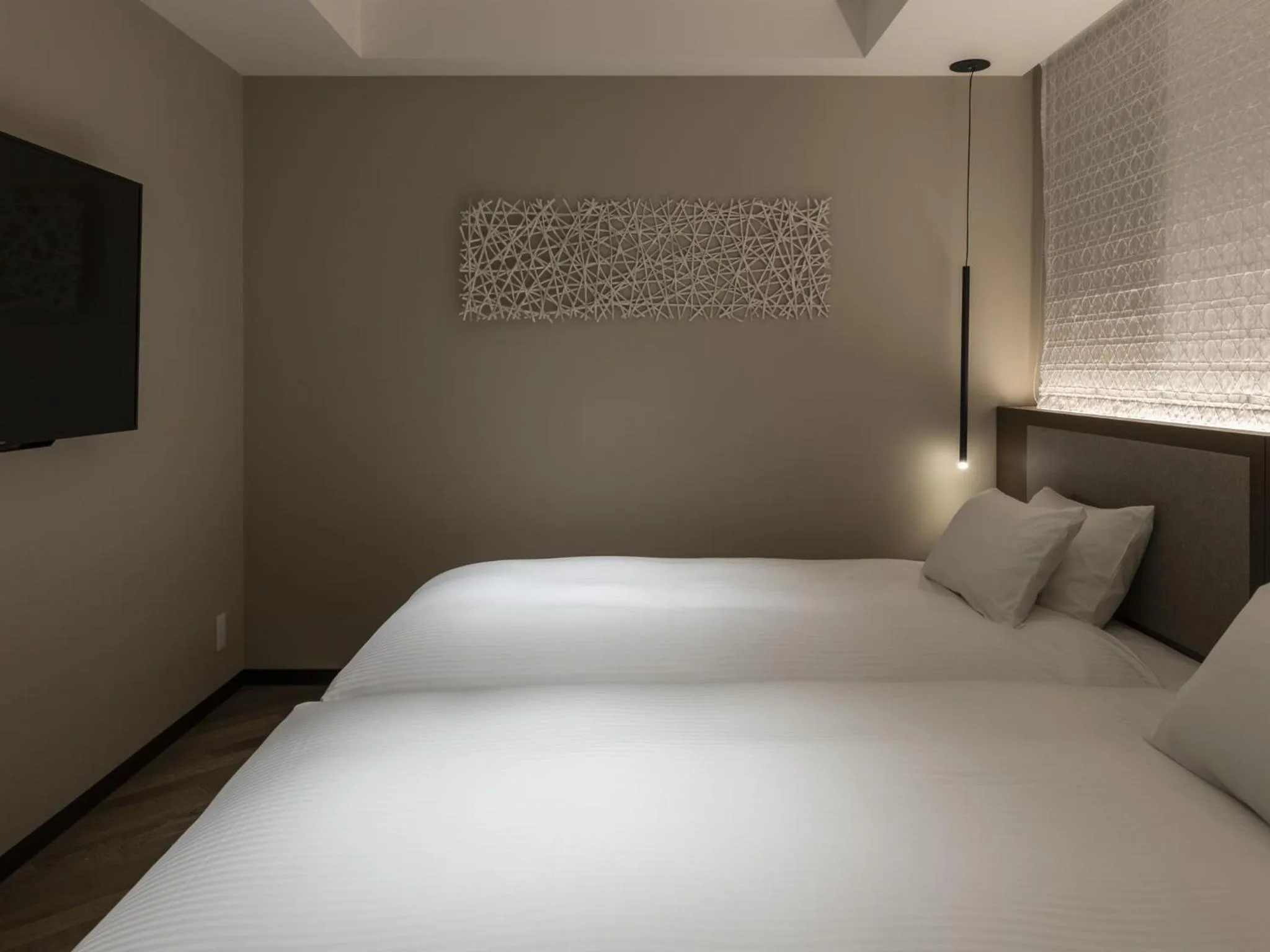 Bed in HOTEL FORZA SAPPORO STATION