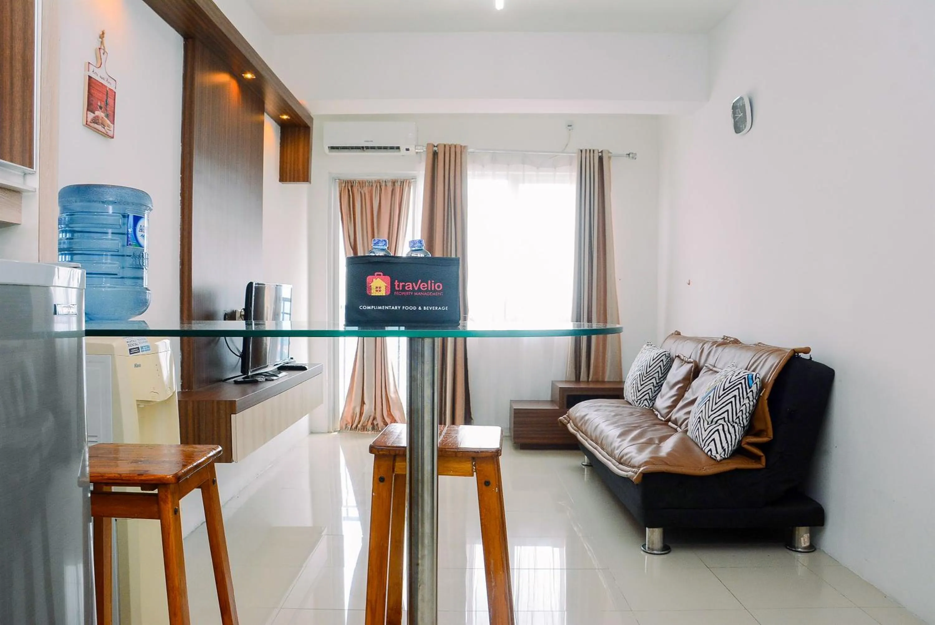 Living room in 2BR Apartment at Park View Condominium near Universitas Indonesia By Travelio