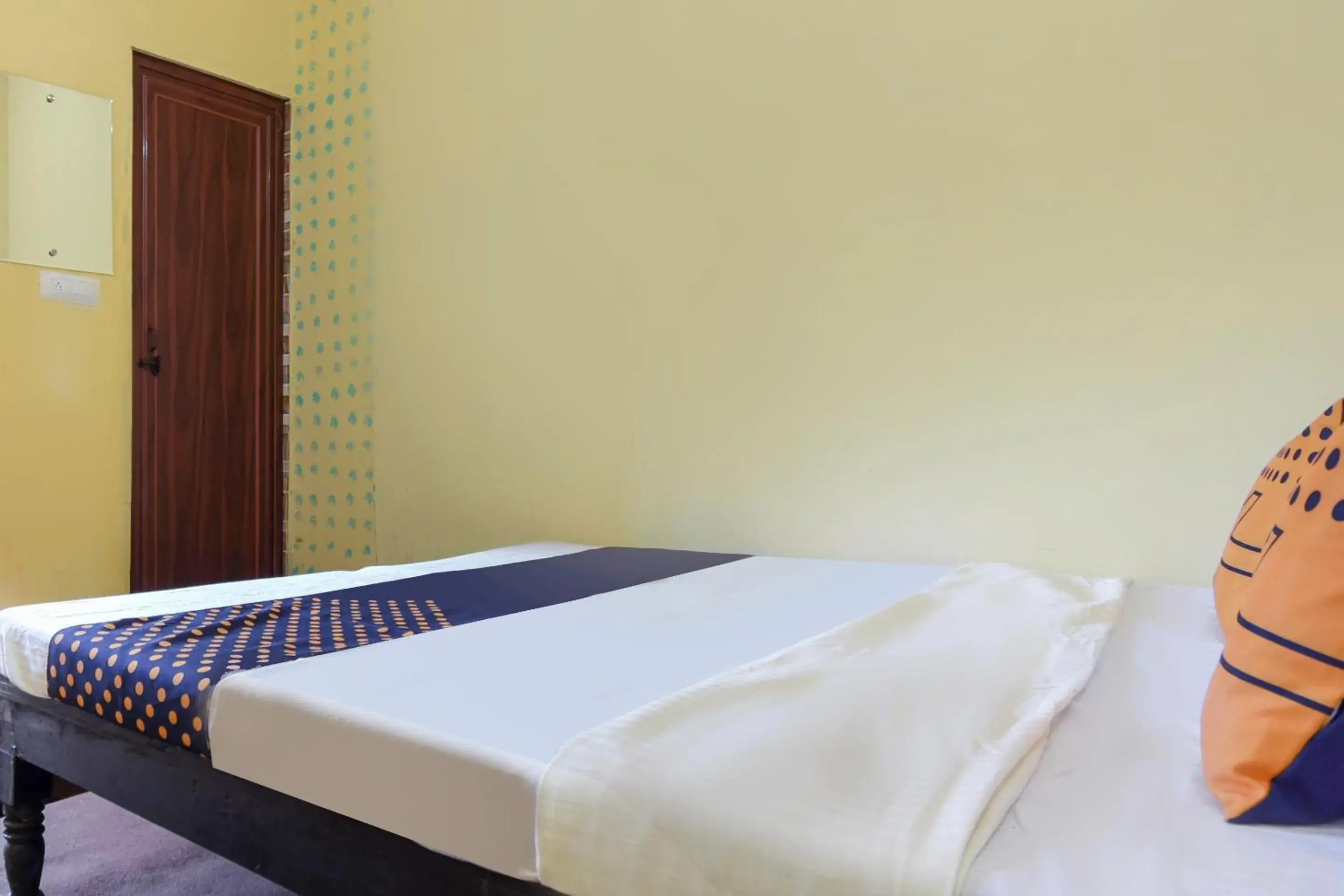 Bedroom in SPOT ON Saini Guest House Bedroom in SPOT ON Saini Guest House