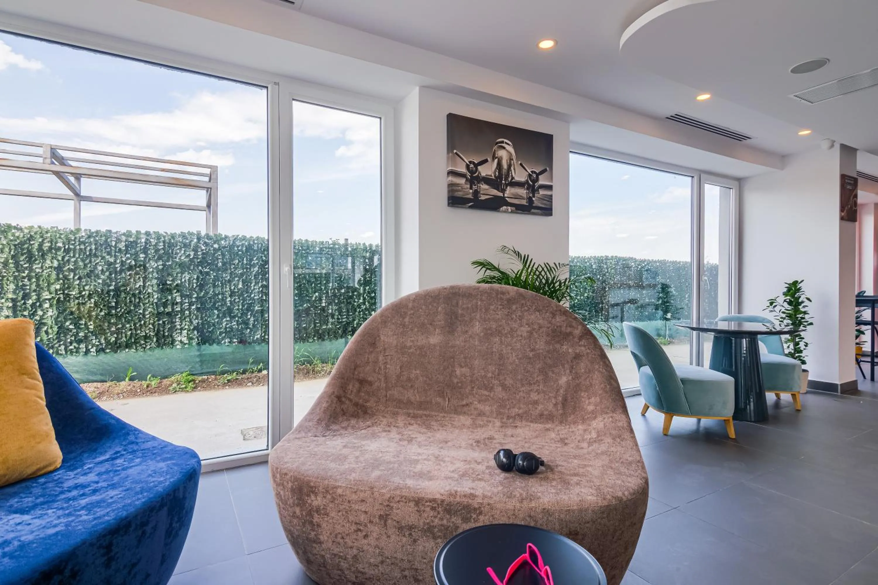 Seating area in Ibis Styles Bucharest Airport