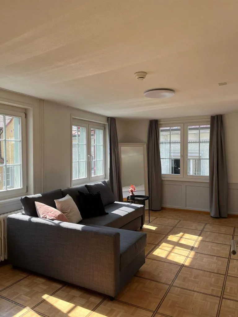 Seating area in Hotel Untertor by Maier - Self-Check-in