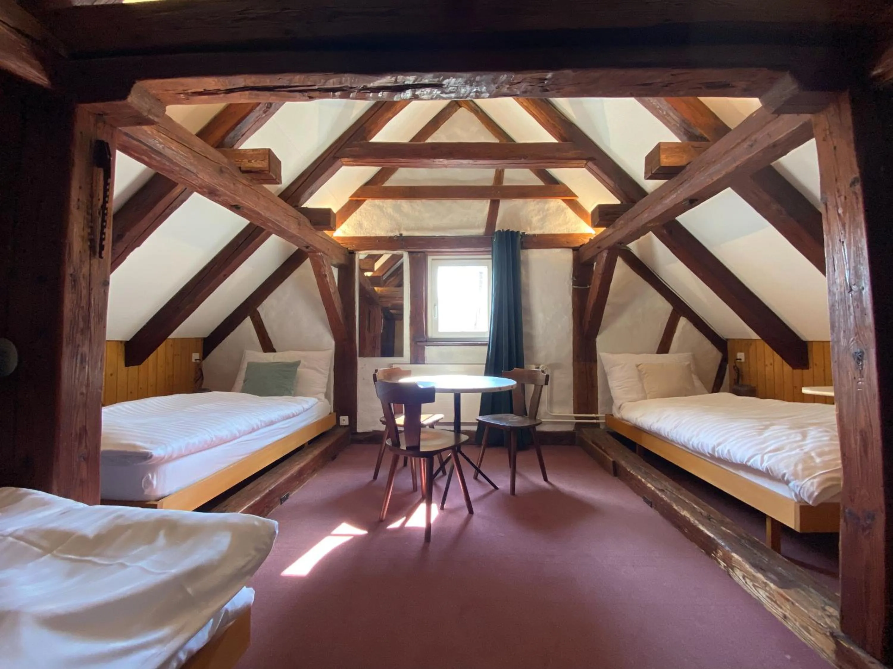 Bed in Hotel Untertor by Maier - Self-Check-in