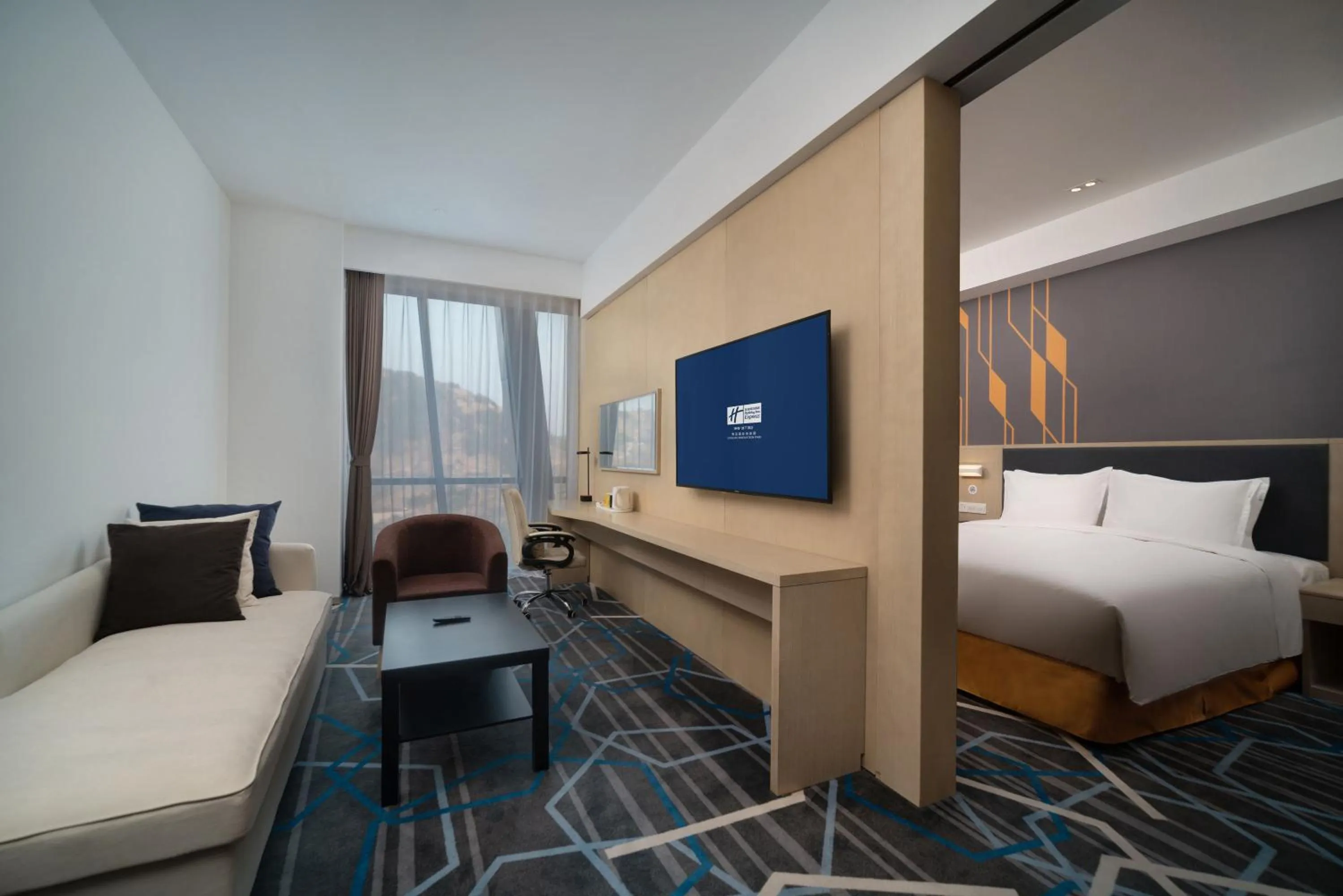 Photo of the whole room, Bed in Holiday Inn Express Qingdao Innovation Park by IHG