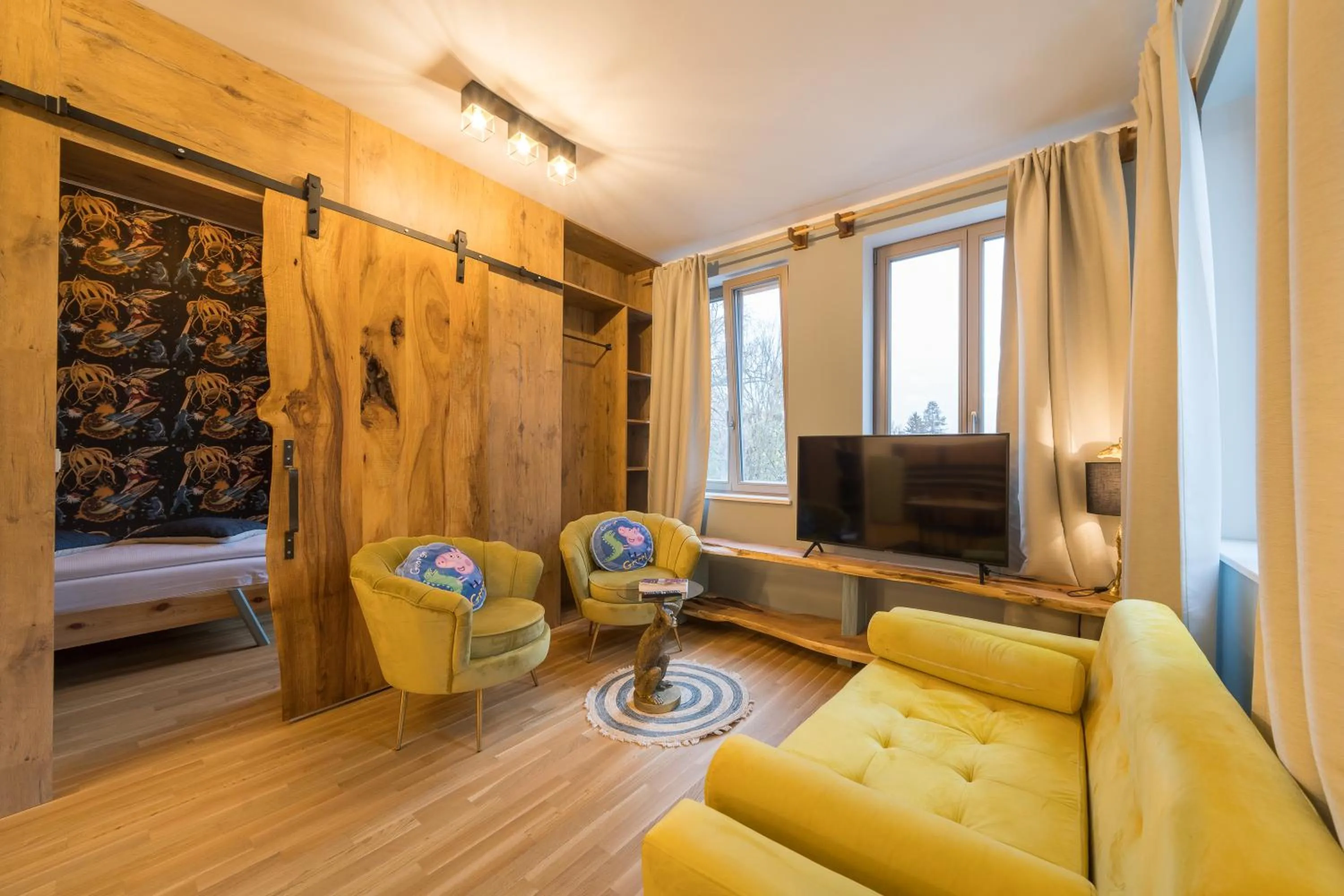 Living room, Bed in Design Apartments - "Am Weinberg"