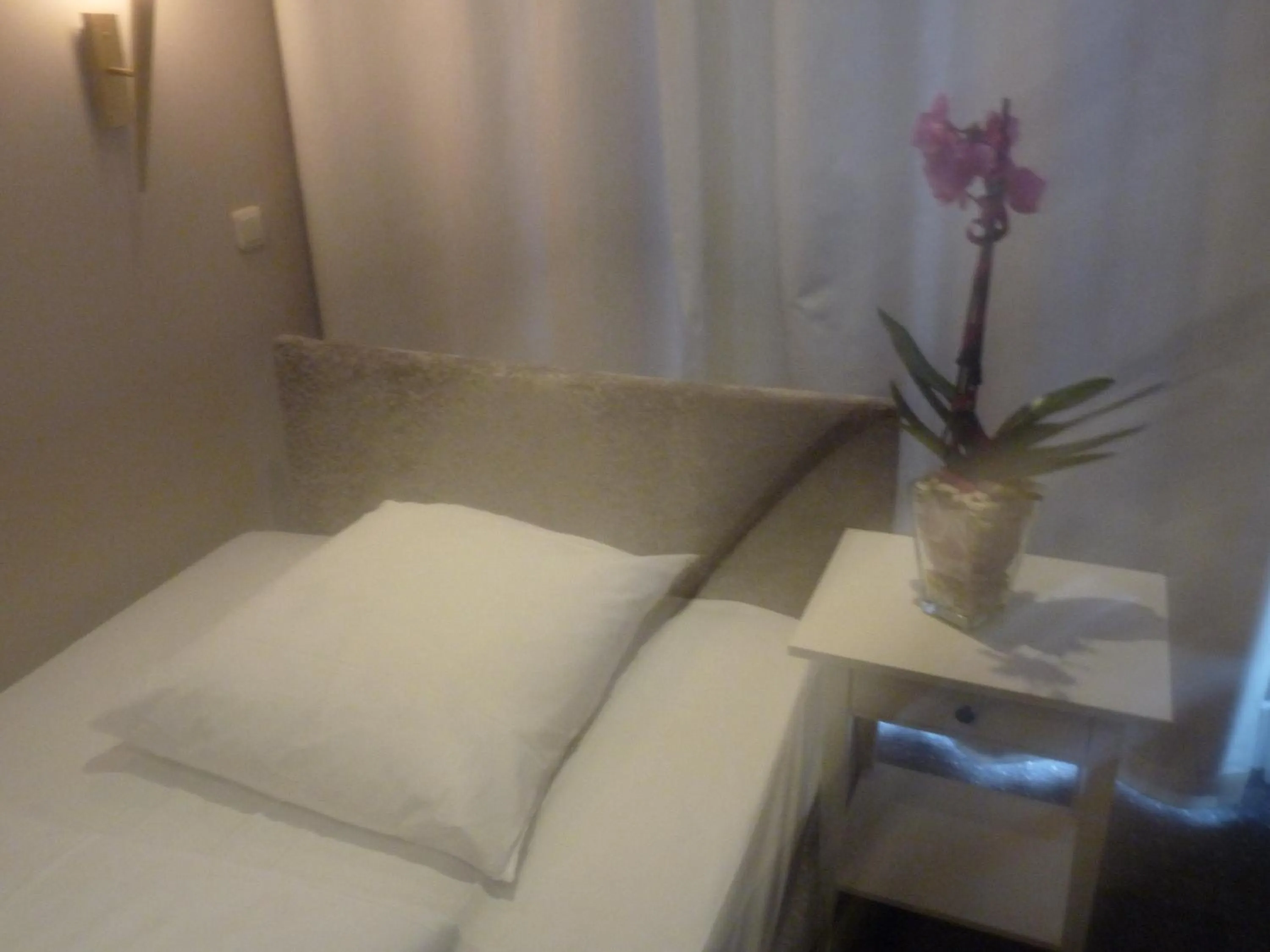 Bed in Hotel Commodore