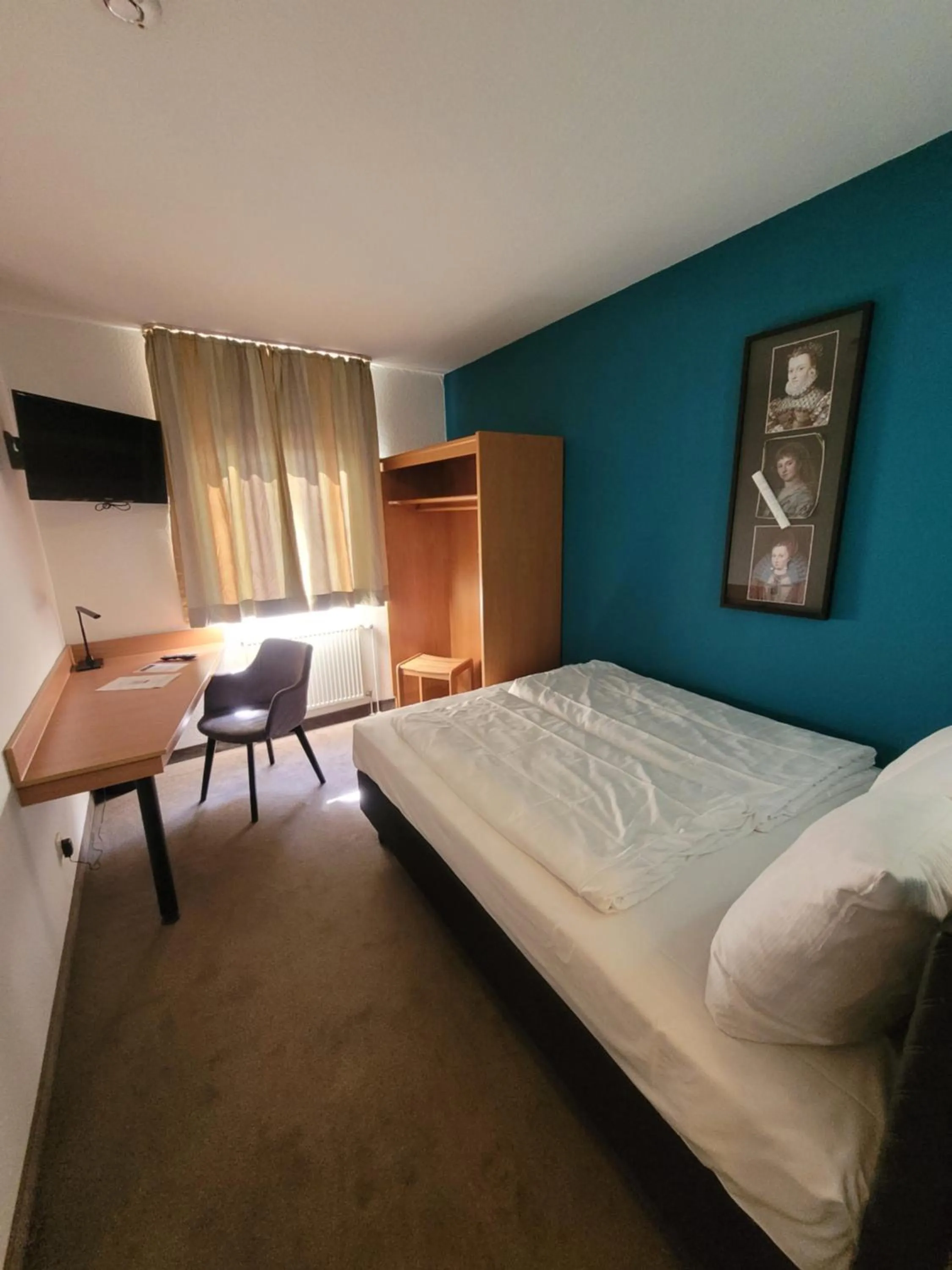 Bed in Hotel Christina