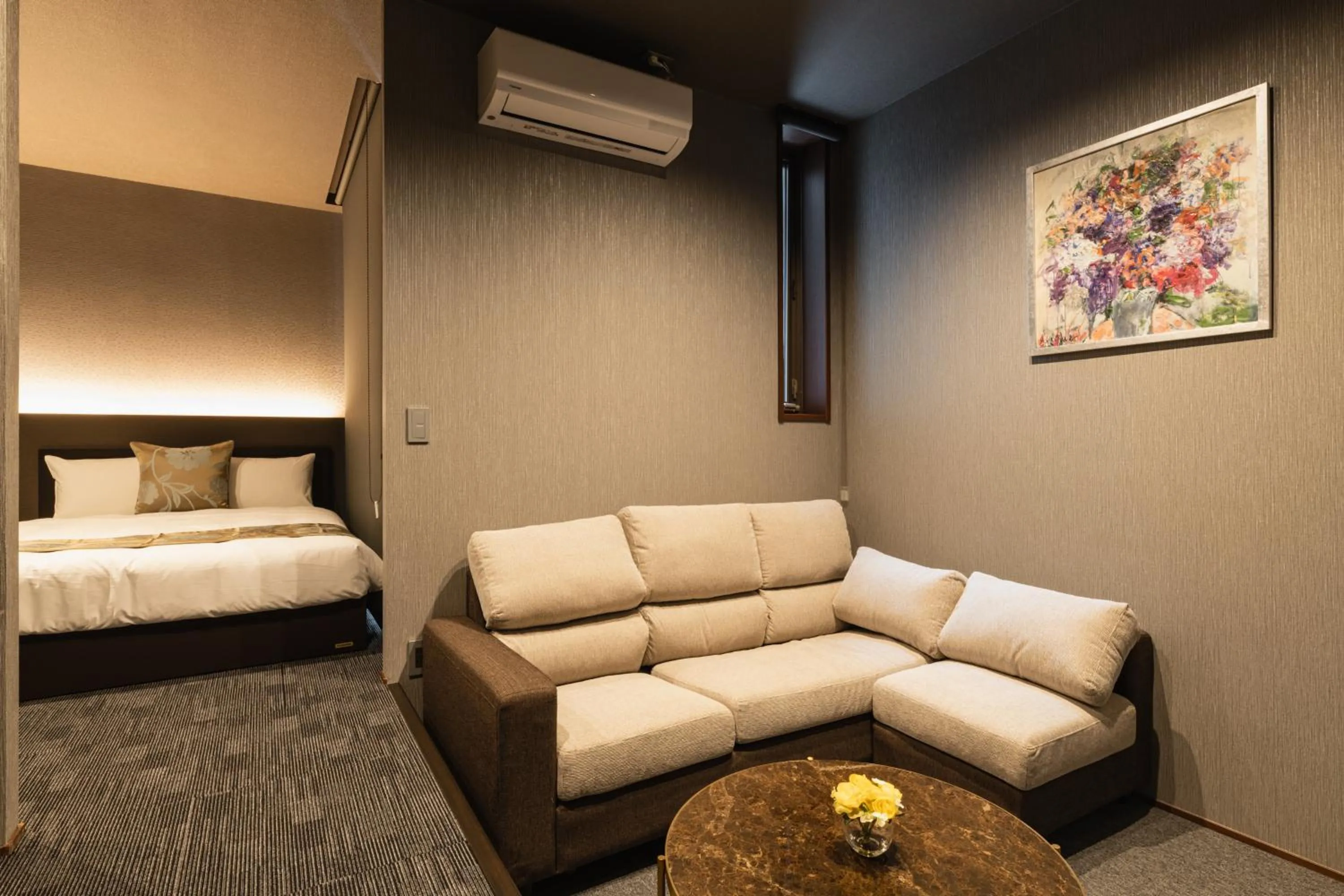 Living room, Bed in GRAND BASE Haruyoshi