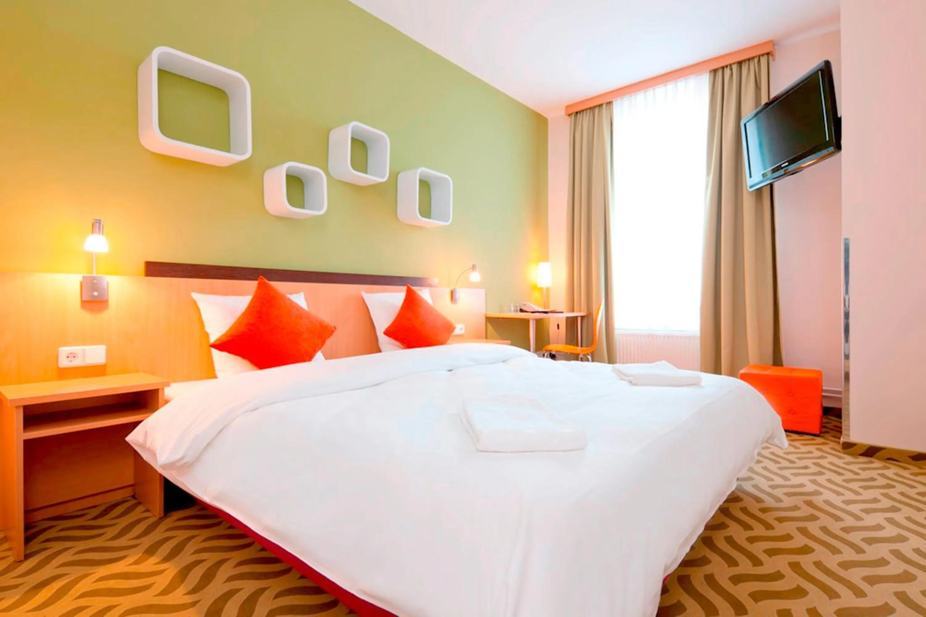 Photo of the whole room in ibis Styles Berlin City Ost
