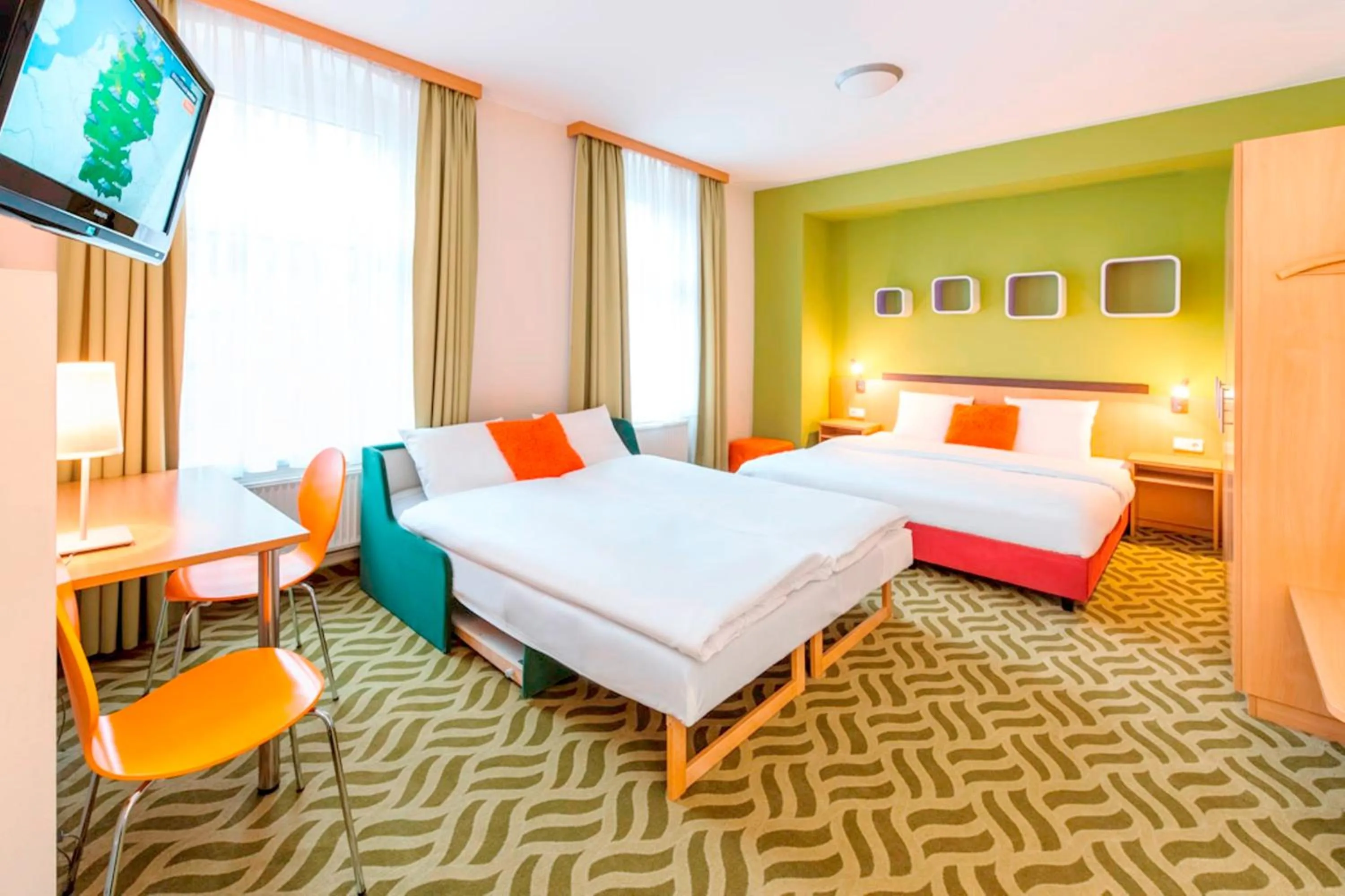 Photo of the whole room in ibis Styles Berlin City Ost