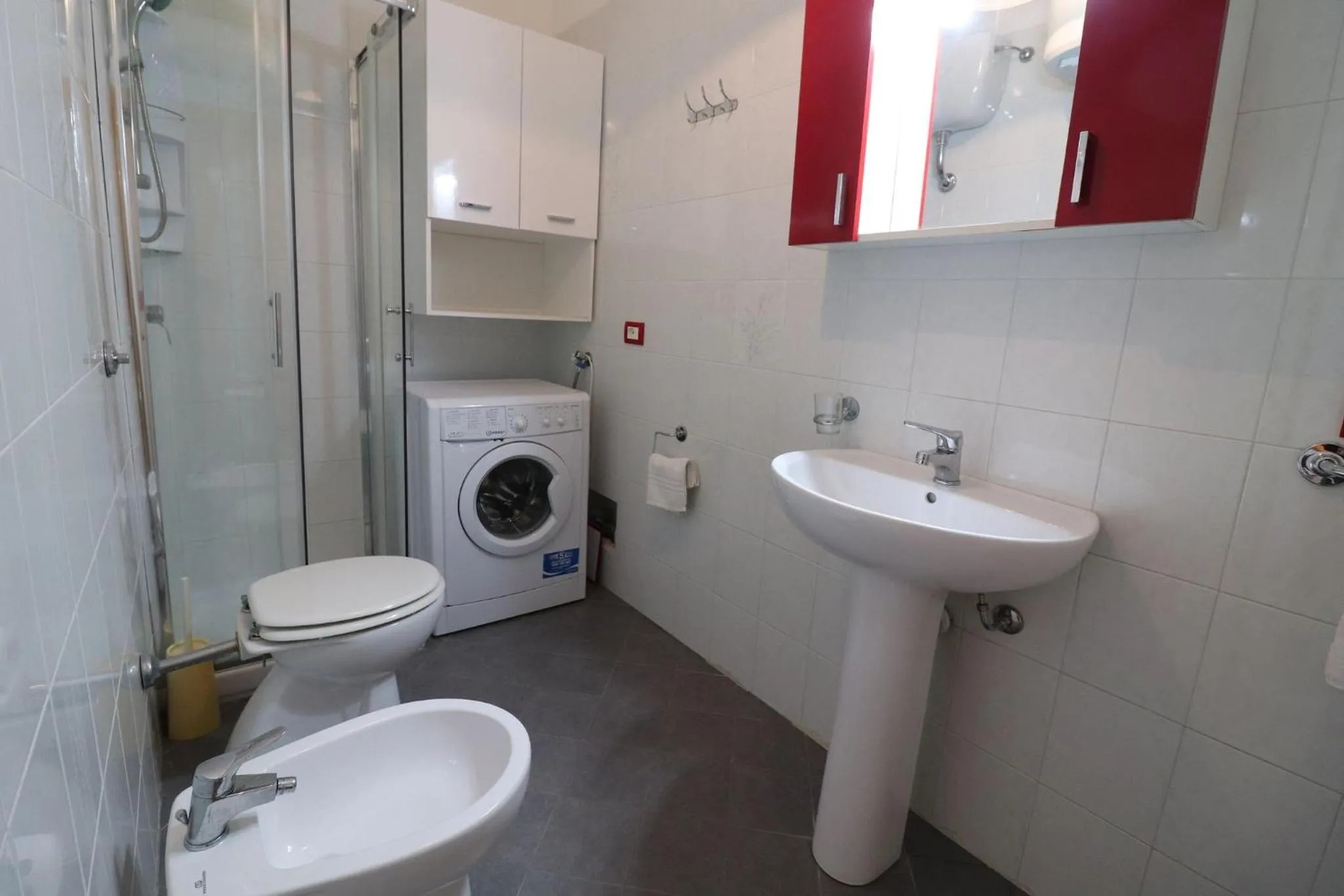 washing machine in Casa Virginia Elegant One-Bedroom Apartment Near the Beach