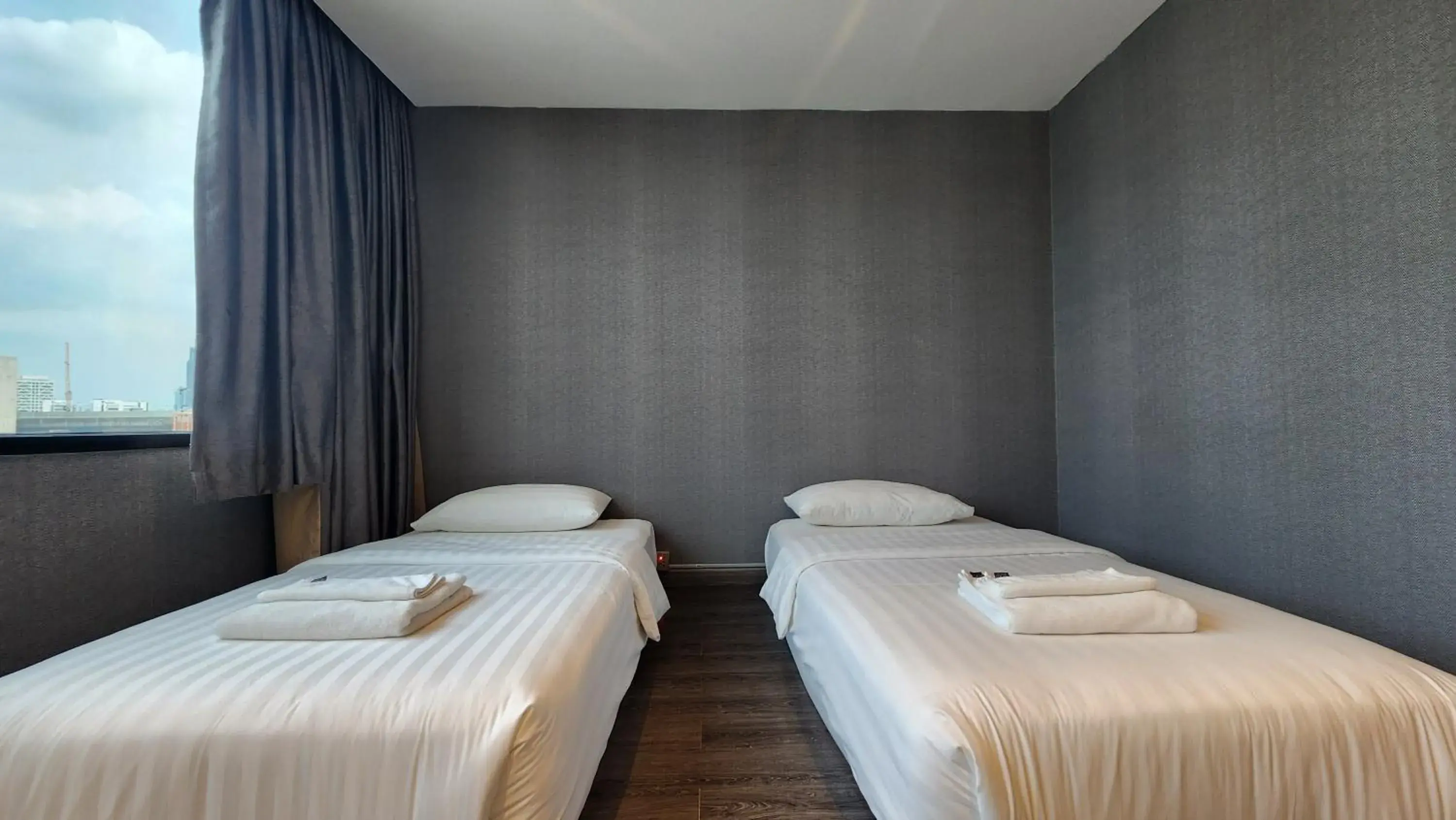 Deluxe Twin Room in Happy Station Bangkok Deluxe Twin Room in Happy Station Bangkok