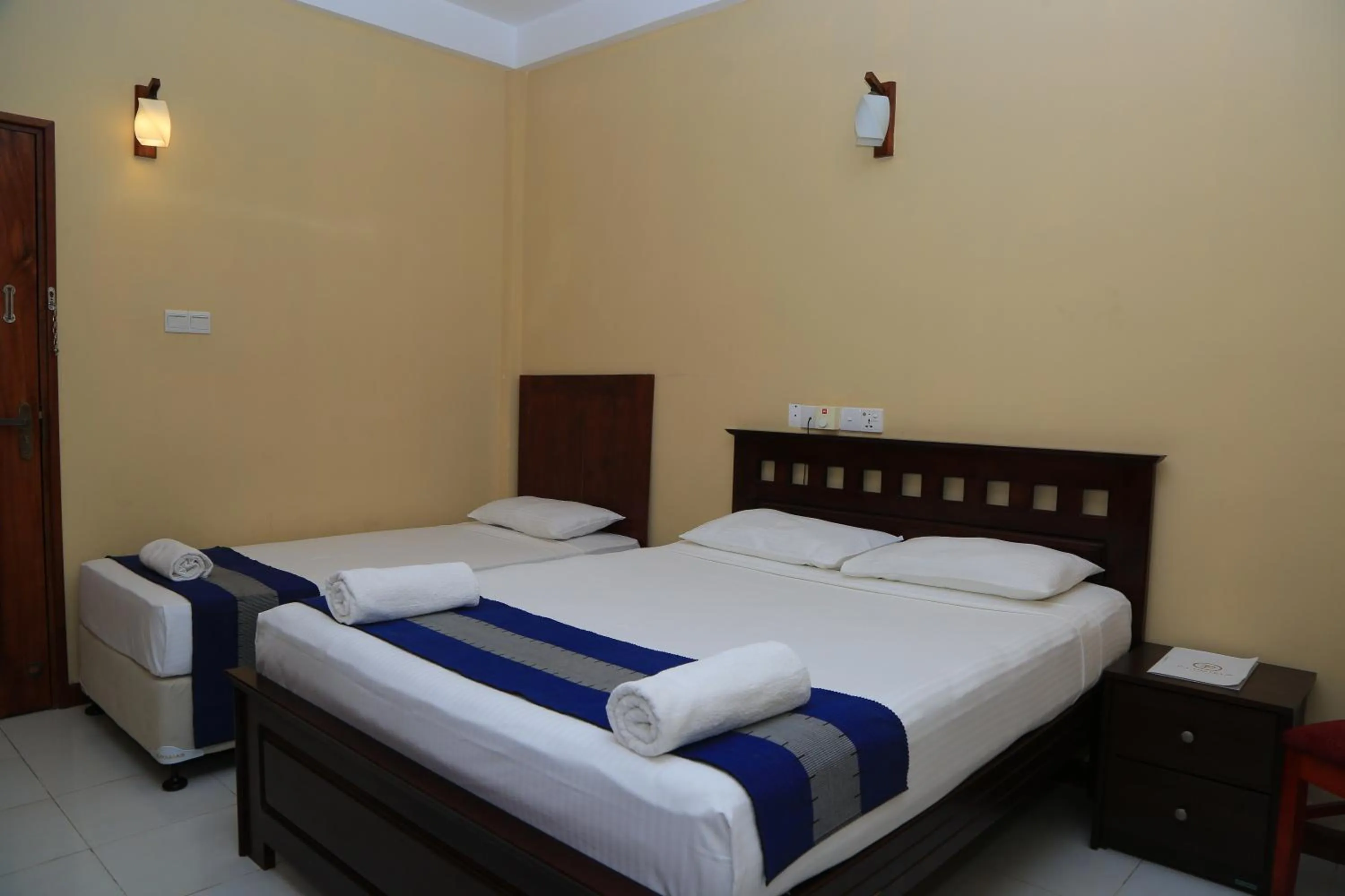 Bed in PJ Hotels Jaffna