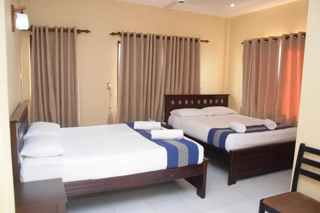 Bedroom, Bed in PJ Hotels Jaffna Bedroom, Bed in PJ Hotels Jaffna