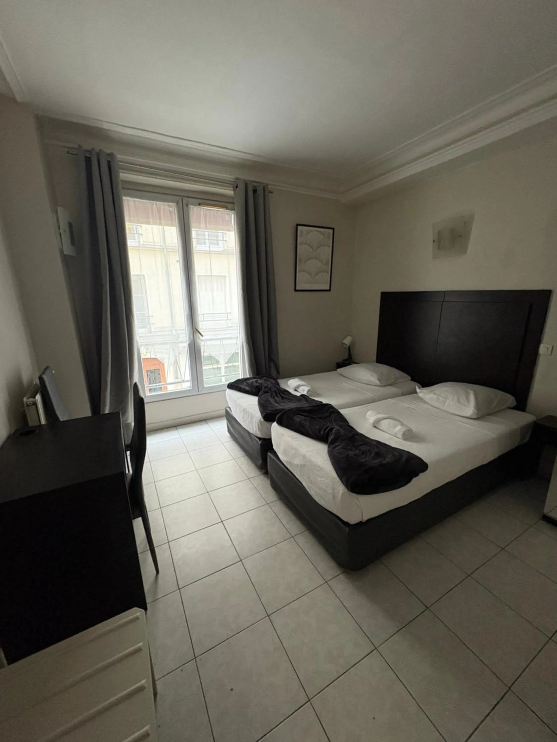 Bed in HOTEL DU MONT LOUIS