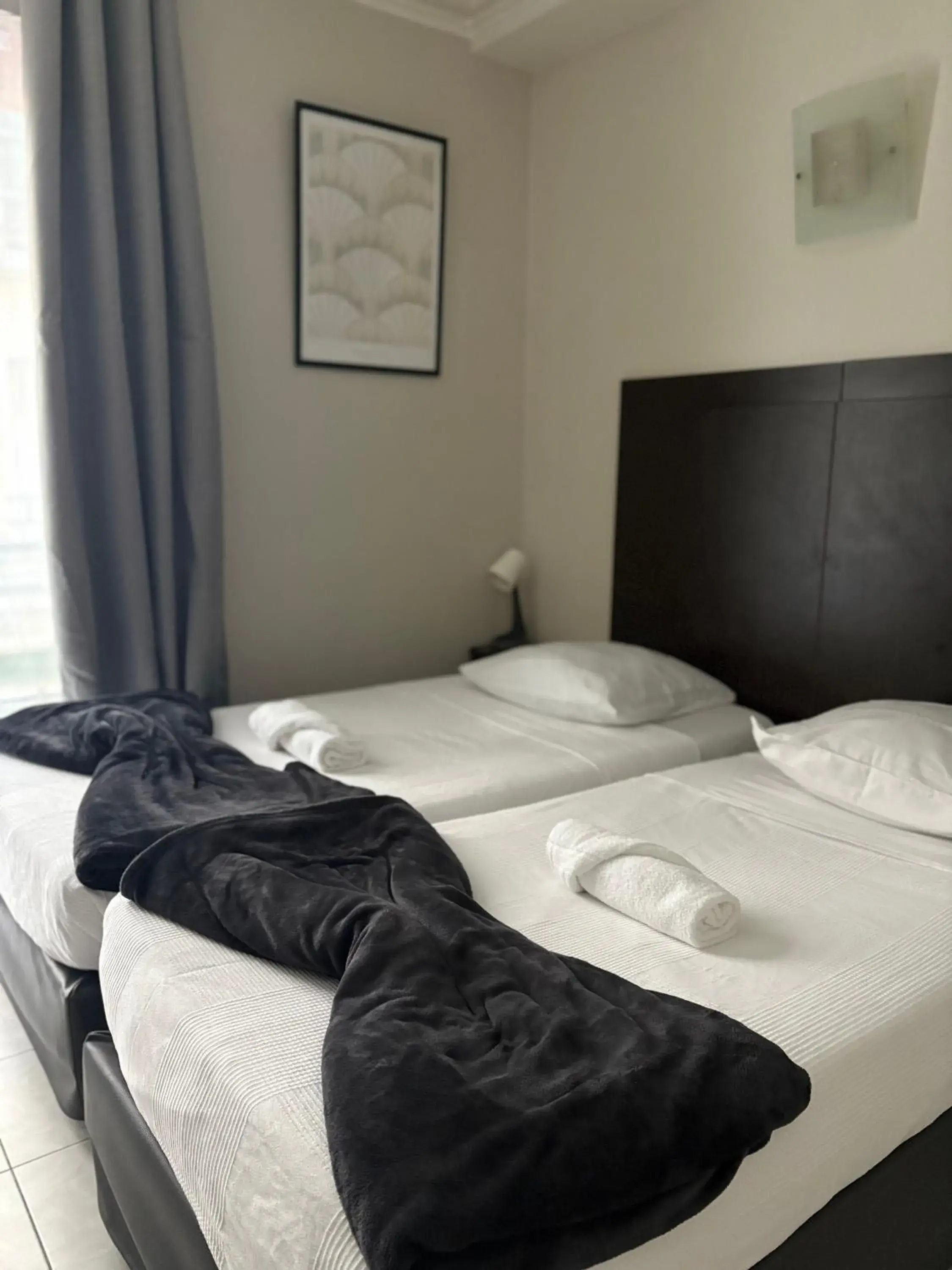 Bed in HOTEL DU MONT LOUIS Bed in HOTEL DU MONT LOUIS