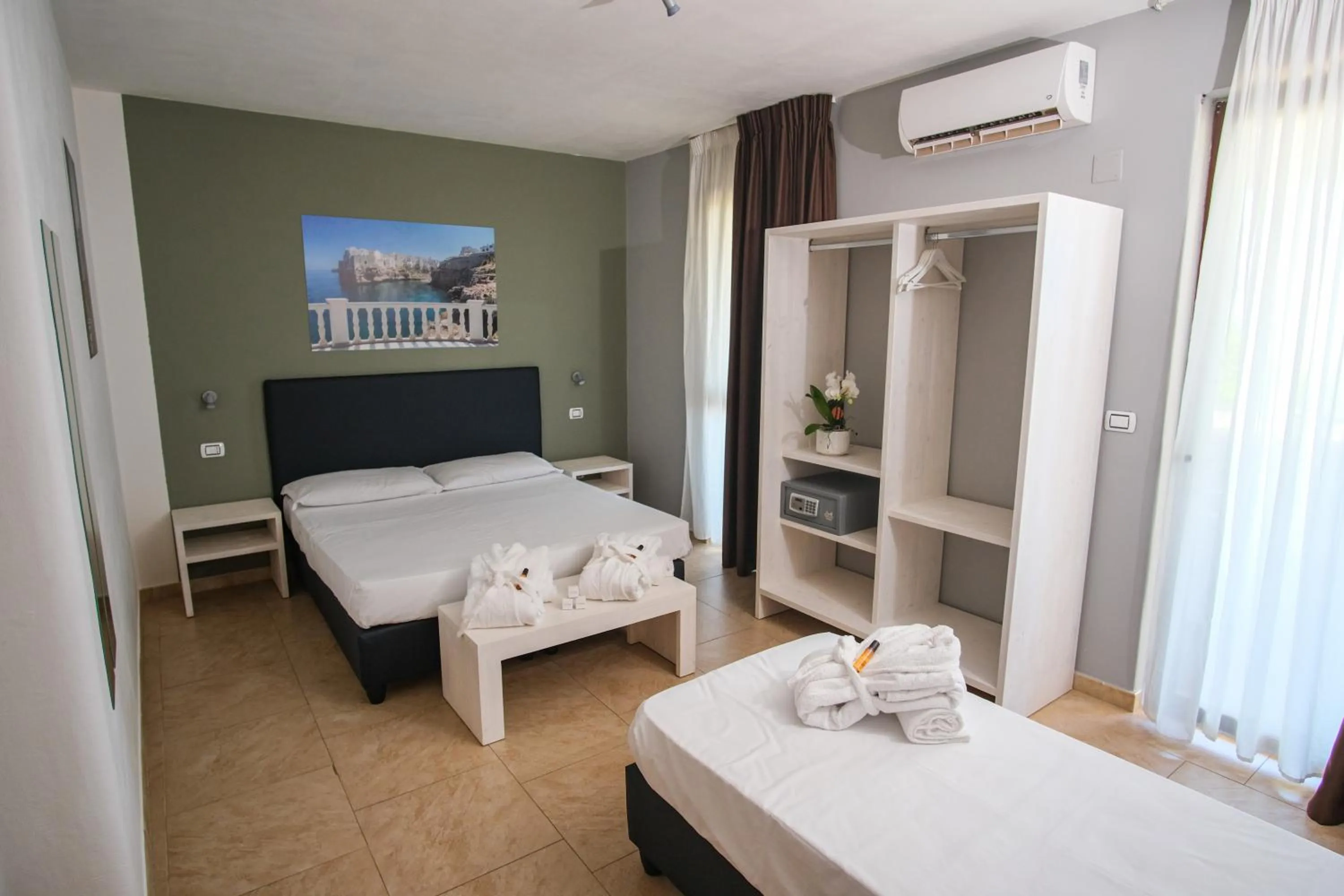 Photo of the whole room, Bed in Torre Guaceto Greenblu Resort