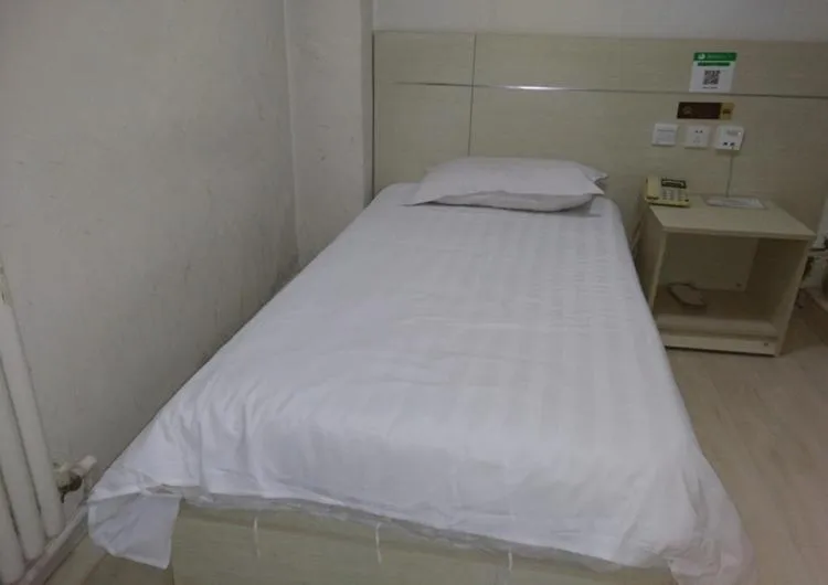 Bed in Thank Inn Chain Hotel Shandong Qingdao huangdao chongming island road