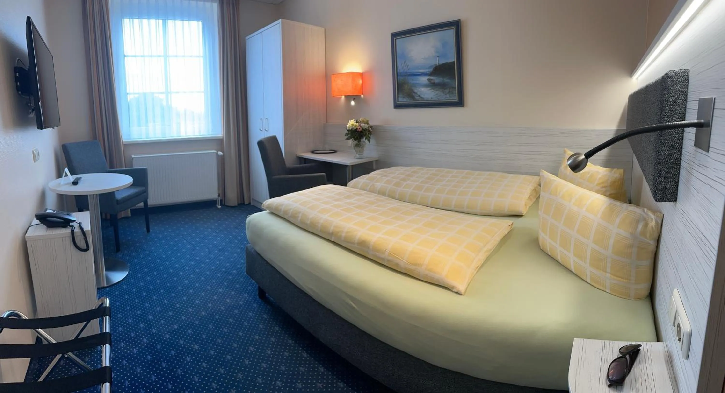 Bed in Dünenhotel am Meer