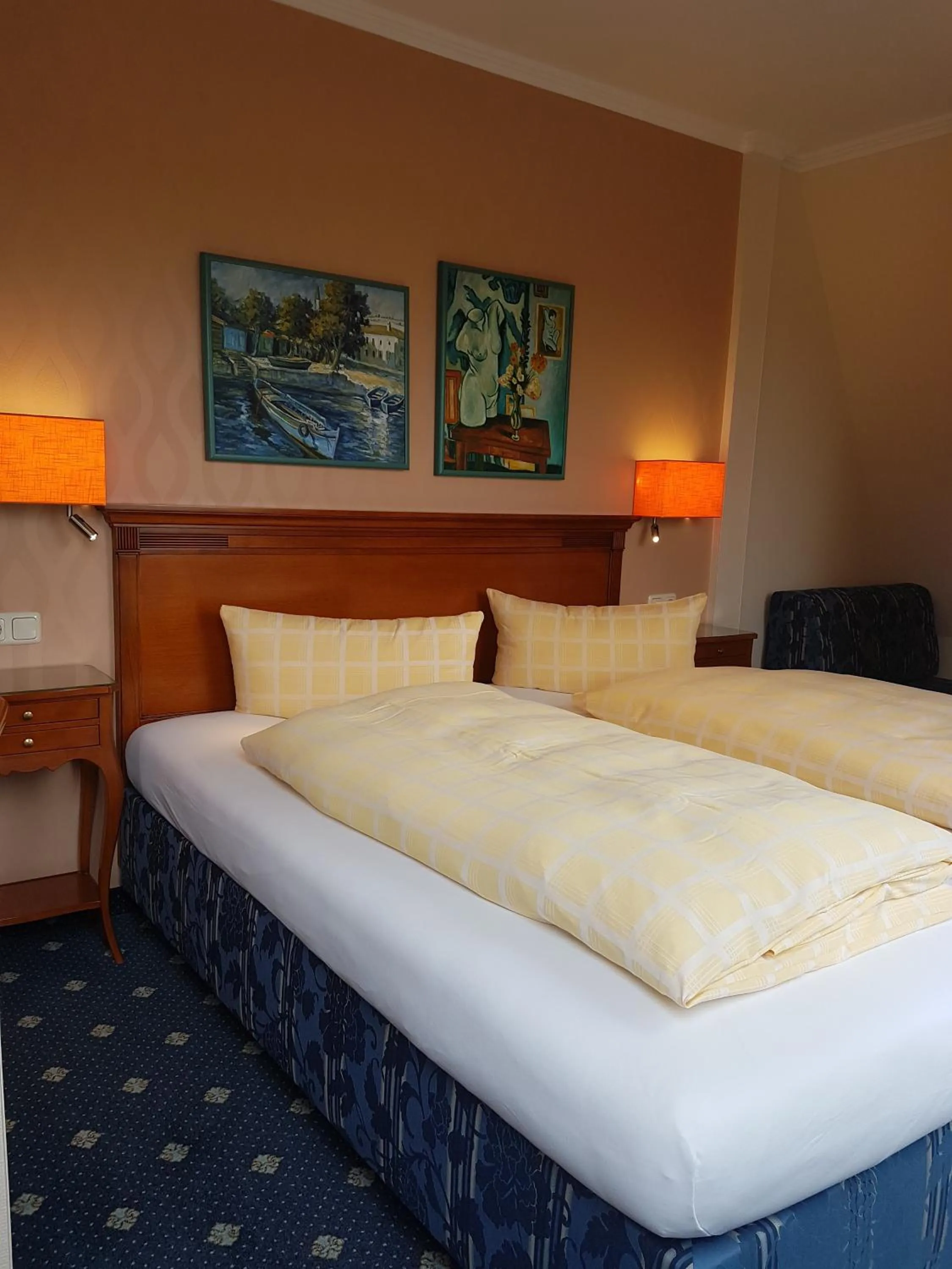 Bed in Dünenhotel am Meer