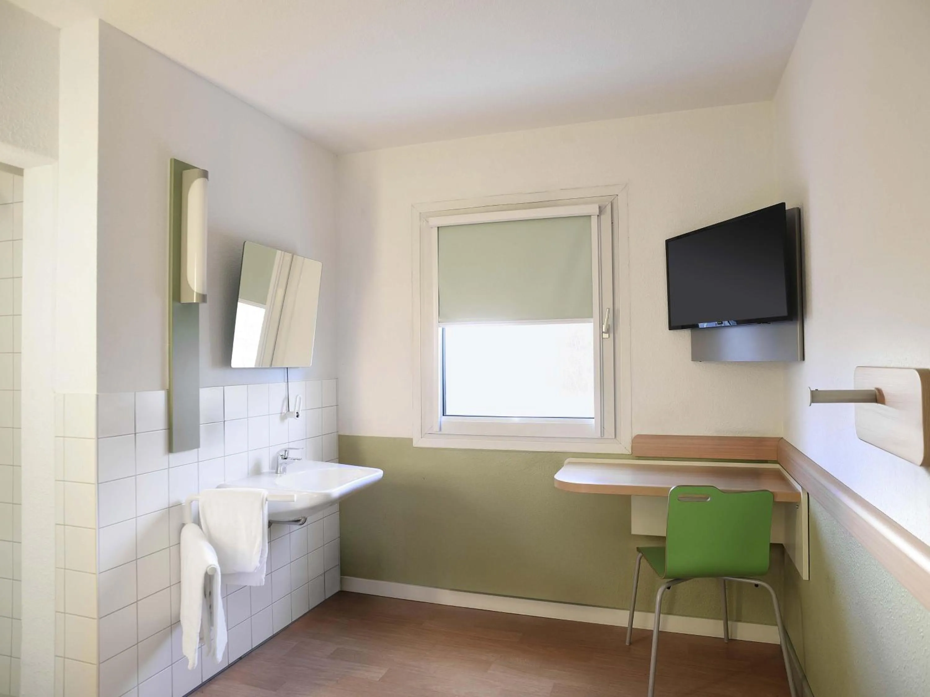 Bathroom in B&B HOTEL Rostock-Broderstorf