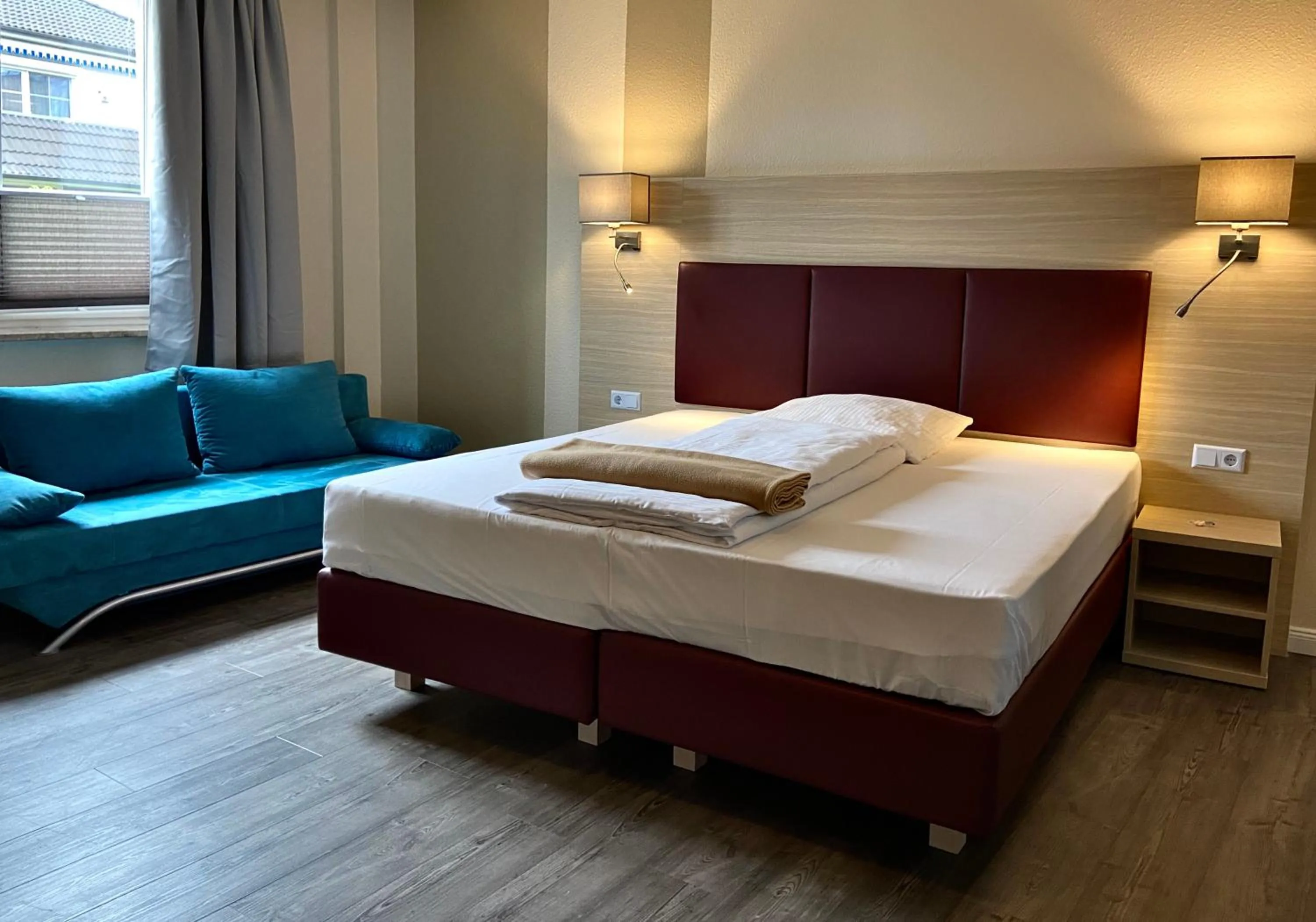 Bedroom, Bed in Residenz Hotel Neu Wulmstorf