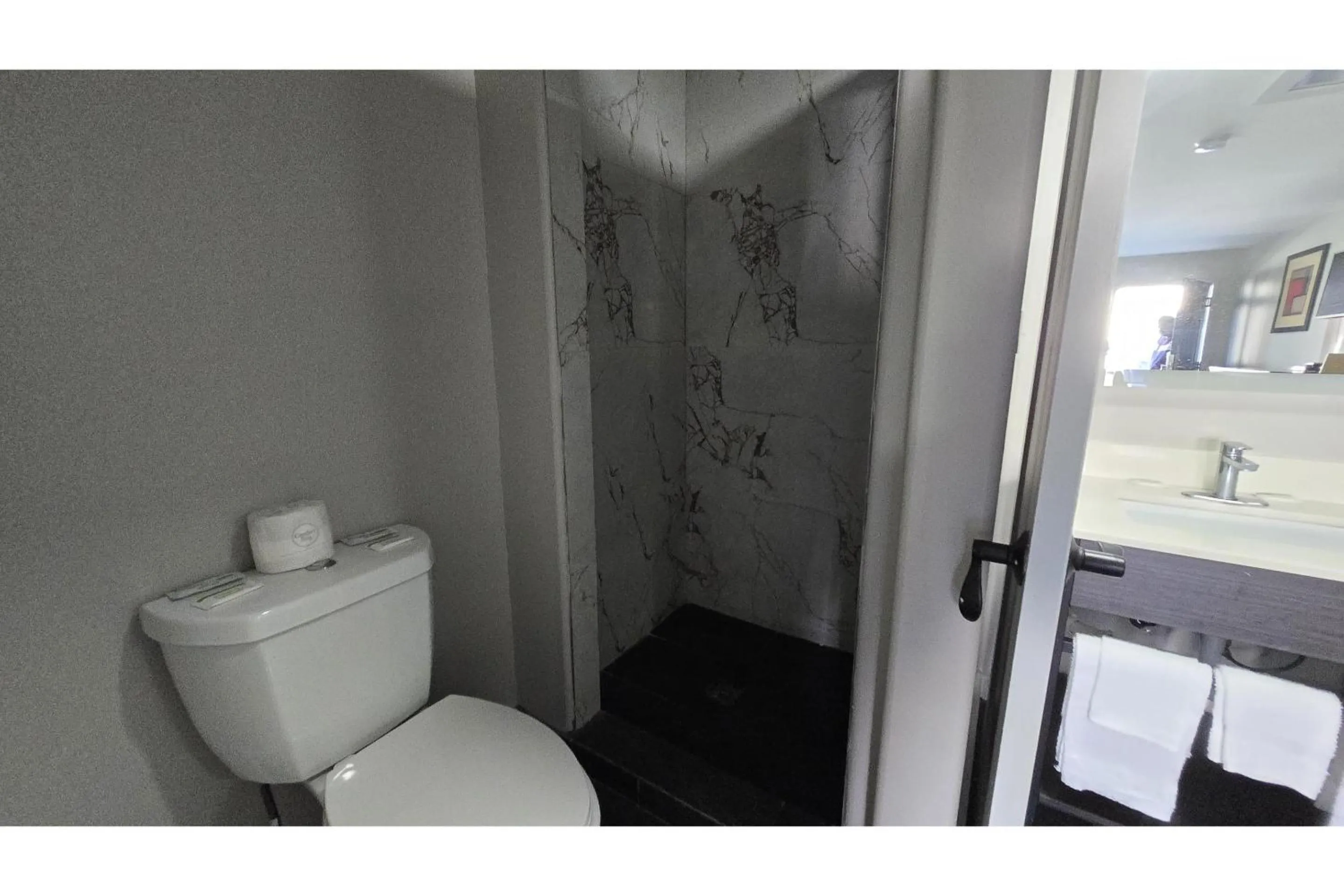 Bathroom in Deerfield Inn by OYO McComb I-55