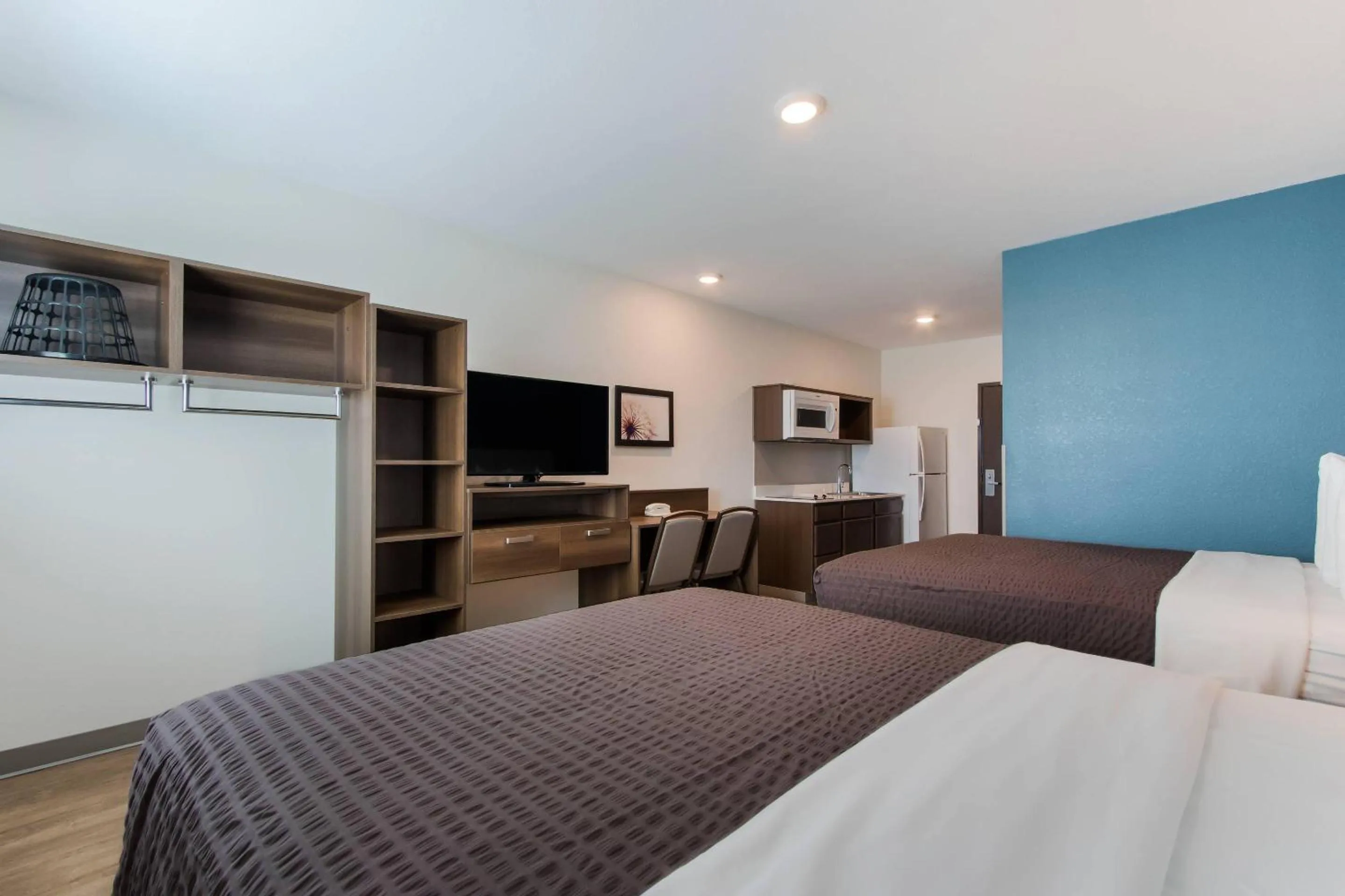 Bedroom, Bed in WoodSpring Suites Tamarac