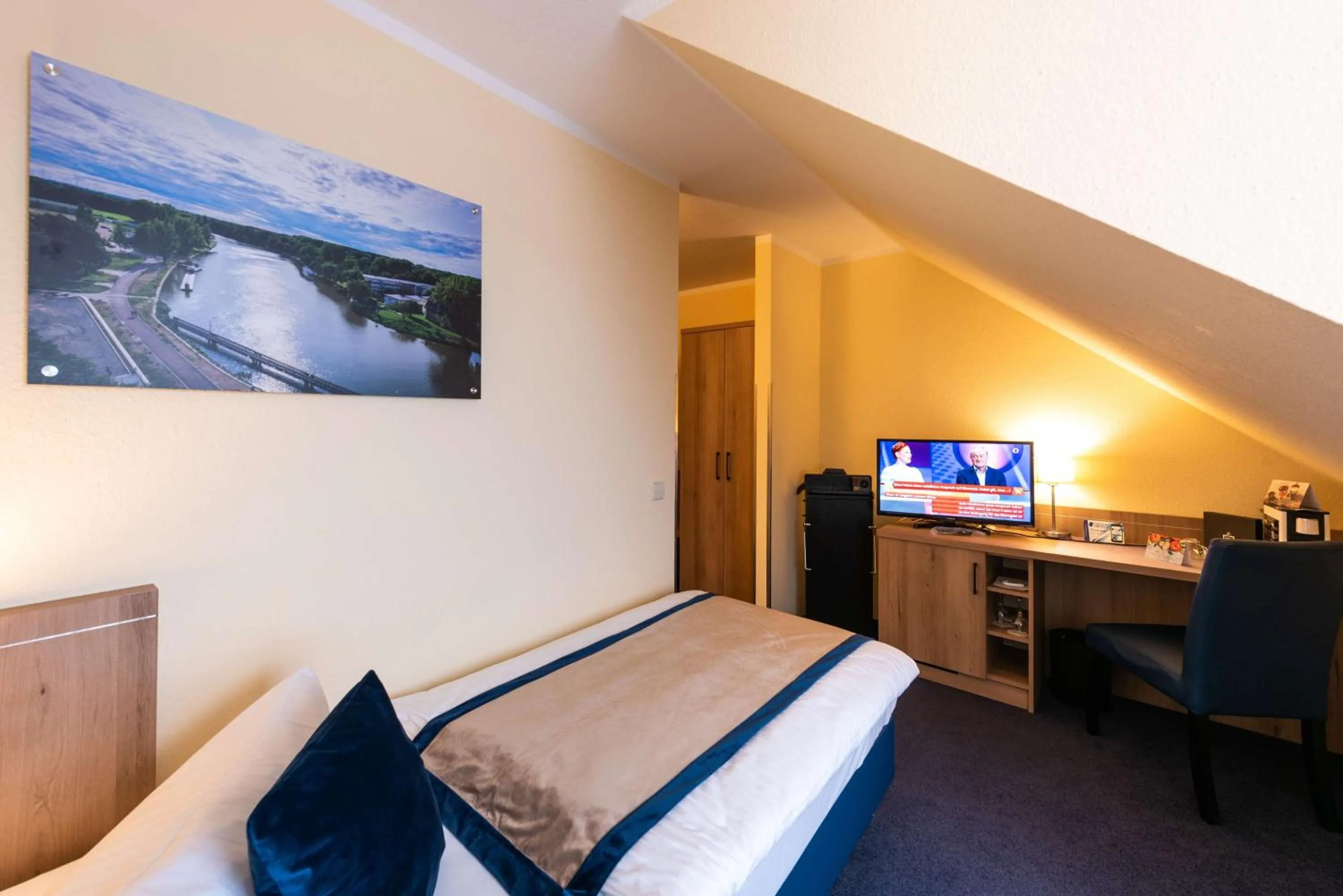 Photo of the whole room, Bed in Askania Hotel & Brauhaus