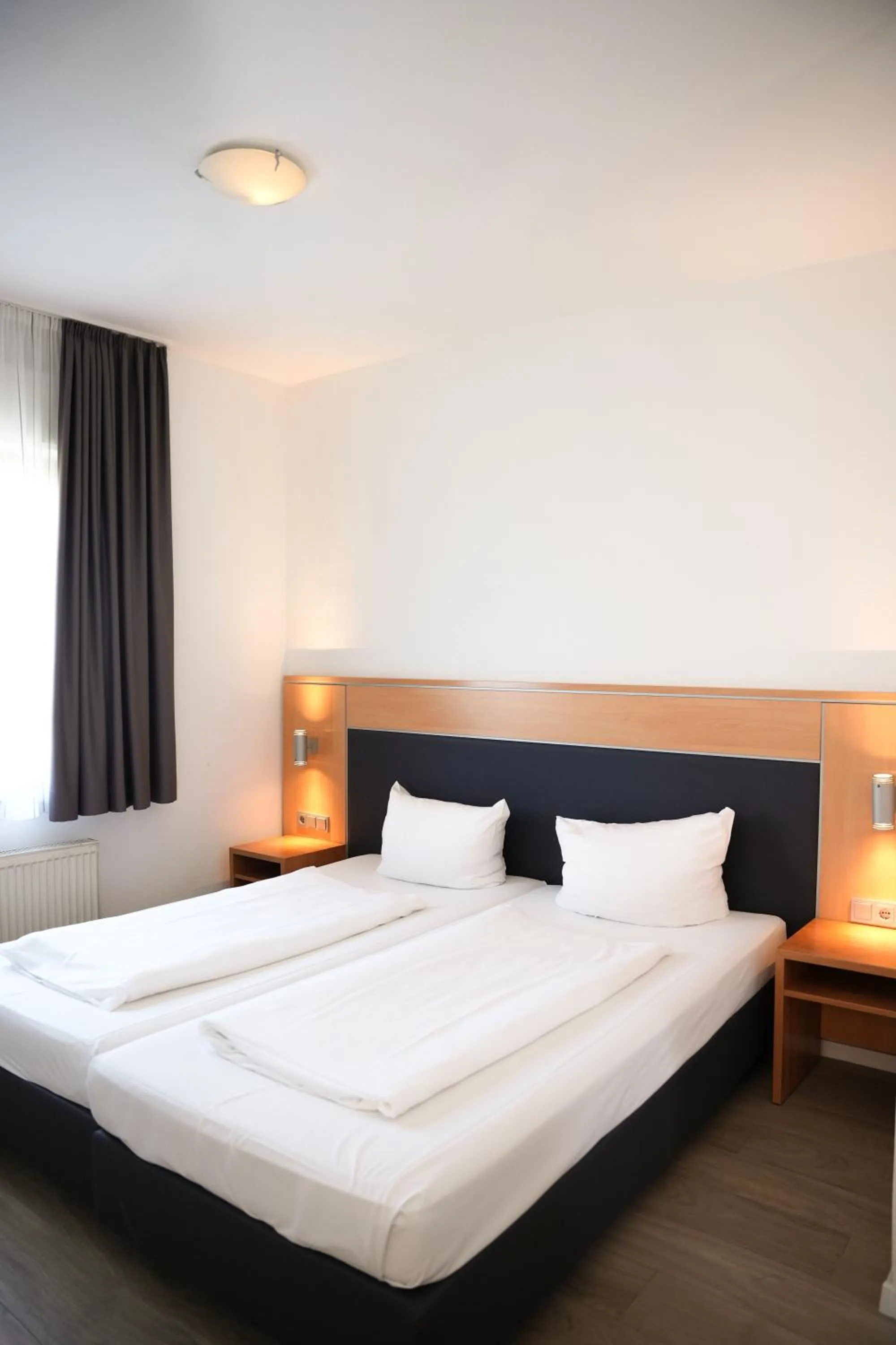 Bed in Hotel Offenbacher Hof